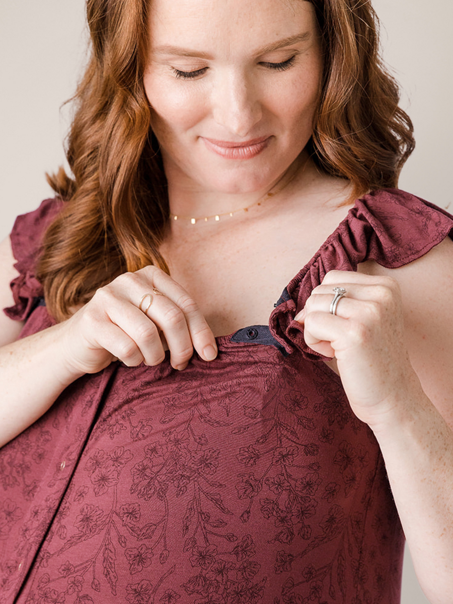 Closeup of the clasp on the strap of the Ruffle Strap Labor & Delivery Gown in Spice Floral