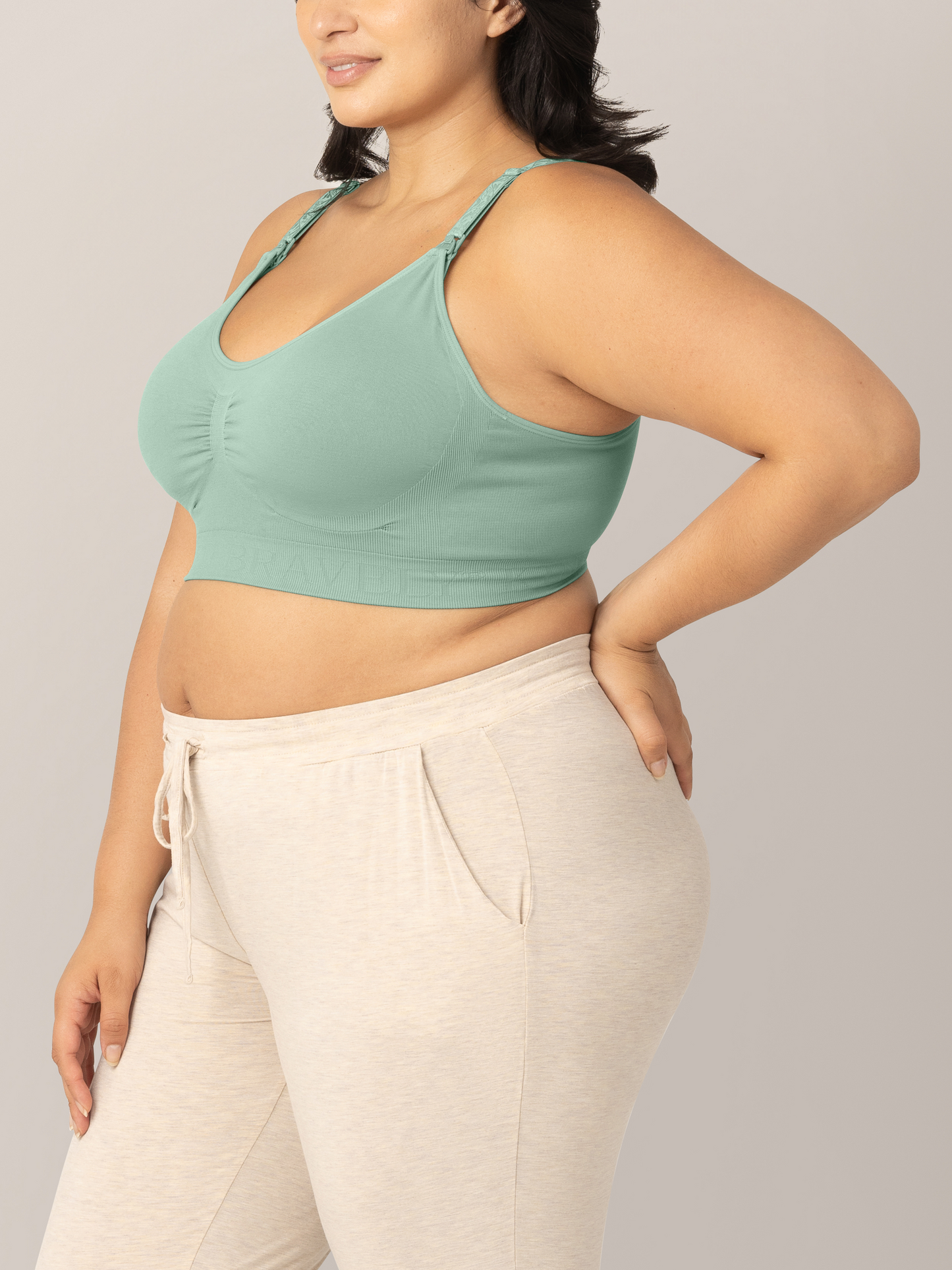 Side view of model wearing the Simply Sublime® Nursing Bra in Cactus in a busty fit