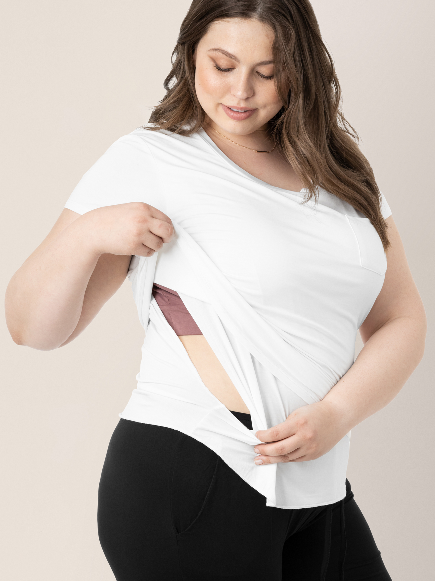 Model wearing the Everyday Maternity & Nursing T-shirt in White showing the nursing access.