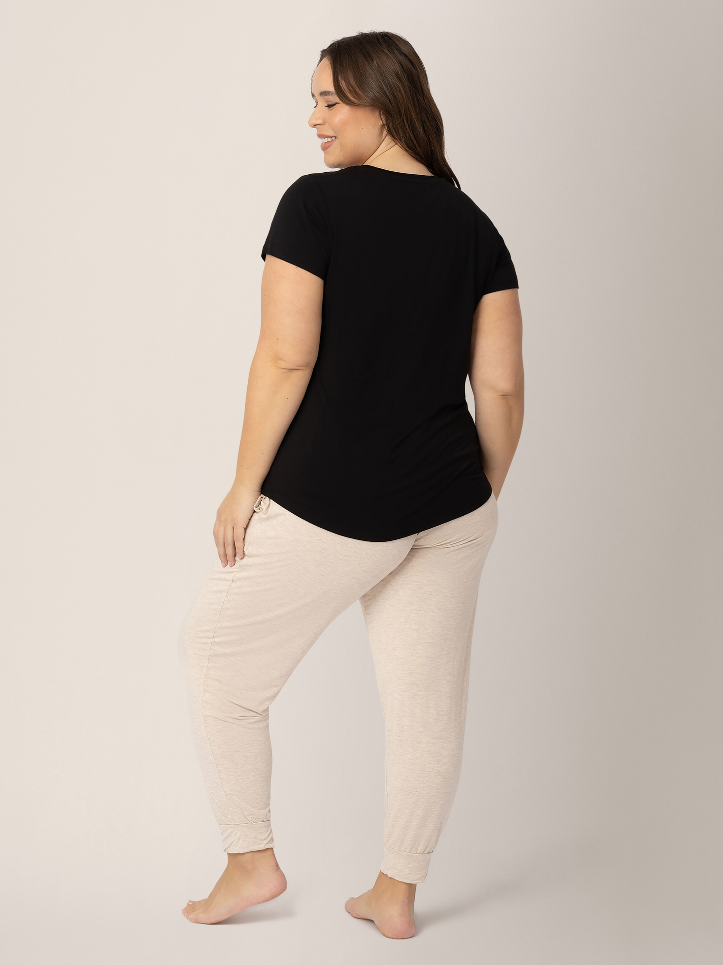 Back of a model wearing the Everyday Maternity & Nursing T-shirt in Black