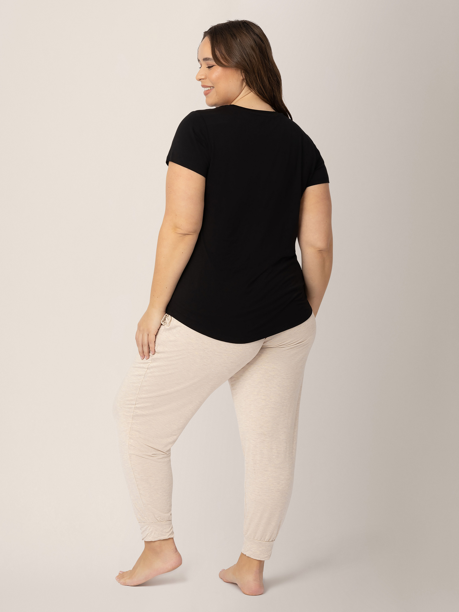 Back of a model wearing the Everyday Maternity & Nursing T-shirt in Black