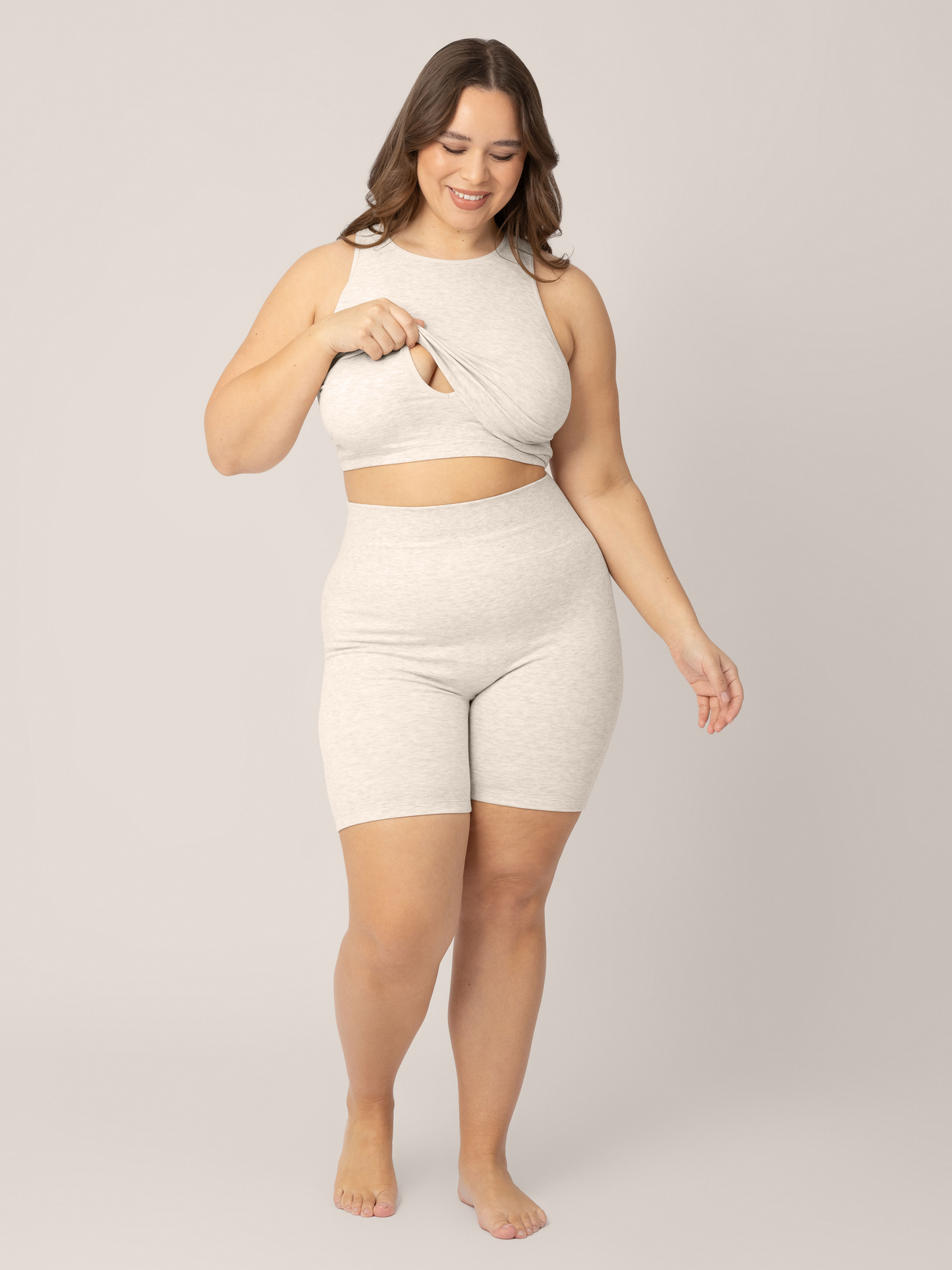 Model wearing the Sublime Bamboo Maternity & Nursing Longline Bra in Oatmeal Heather showcasing the nursing functionality