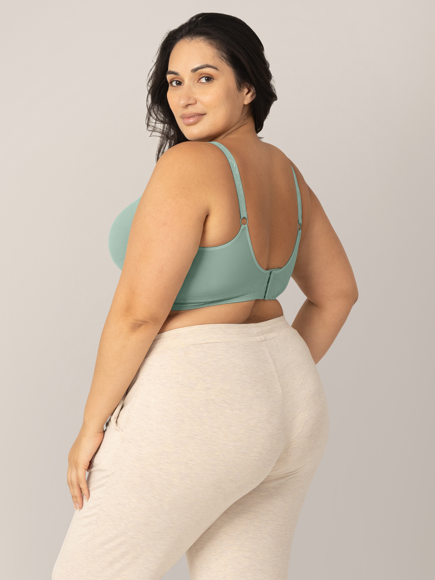 3/4 back view of model wearing the Simply Sublime® Nursing Bra in Cactus in a busty fit