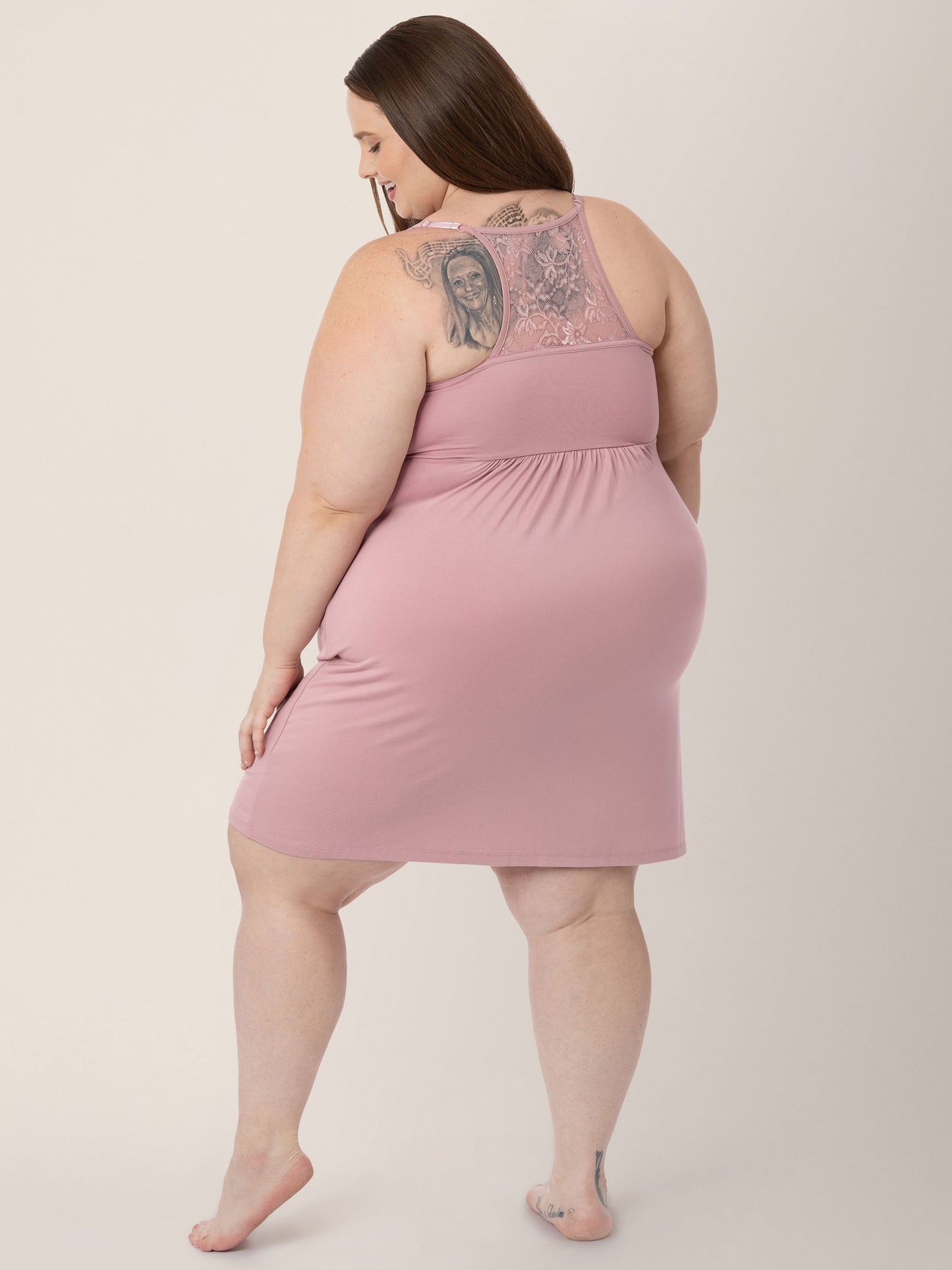 Back view of a model wearing the Lucille Maternity & Nursing Nightgown in Vintage Pink.
