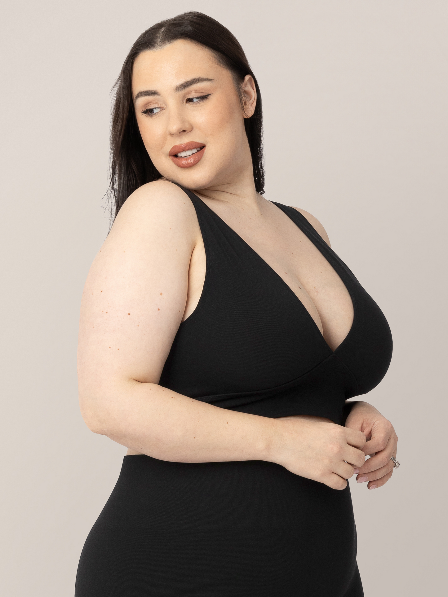 Side view of Model wearing the Sublime Bamboo Maternity & Nursing Plunge Bra in black.@model_info:Rachel is wearing an X-Large Busty.