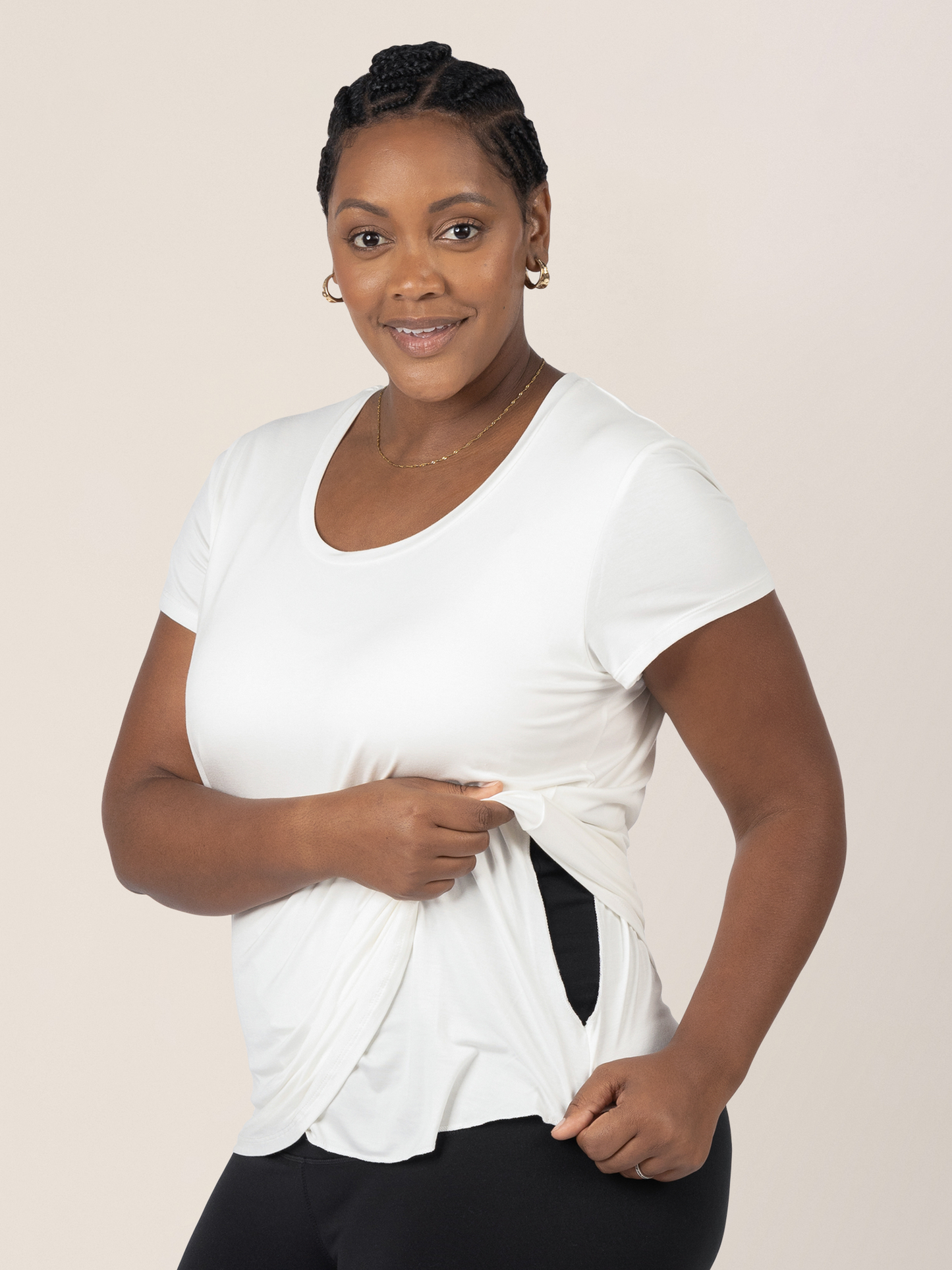 Model wearing the Everyday Maternity & Nursing T-shirt in White showing the easy pull aside nursing access panel.