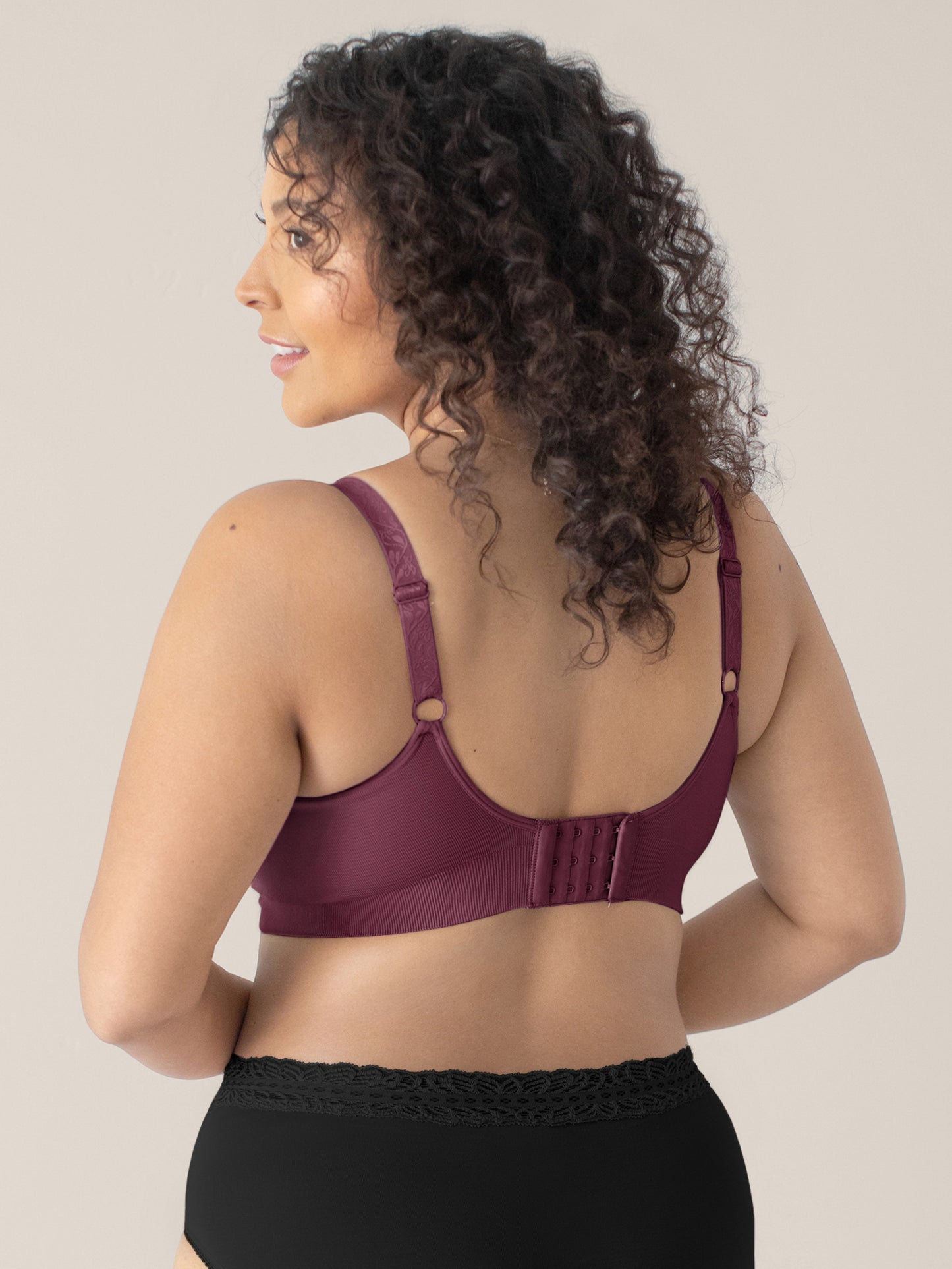 Back view of a model wearing the Nellie Sublime® Wireless Bra in Fig.