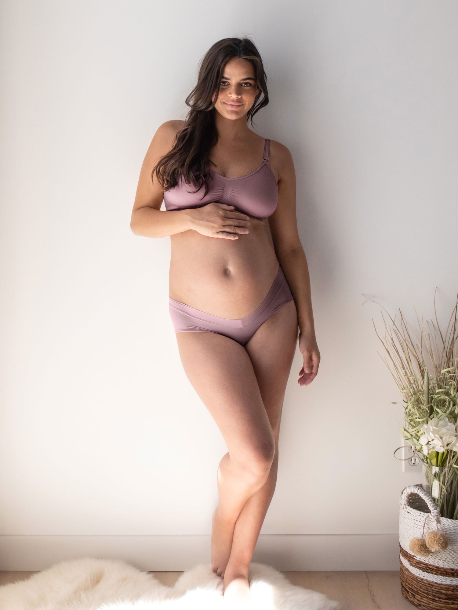 Full body image of a model wearing the Grow with Me™ Maternity & Postpartum Hipster in Twilight