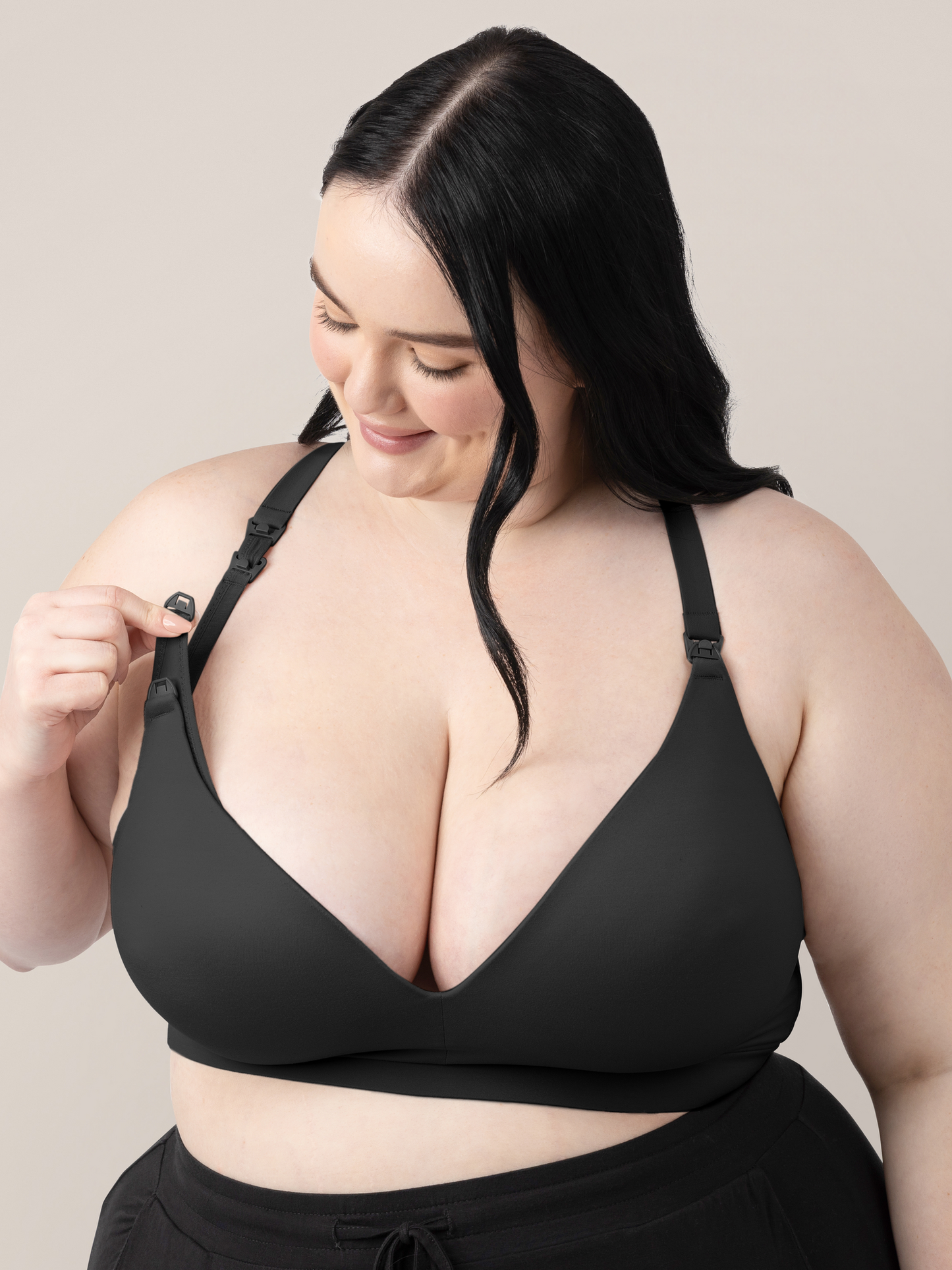 Model wearing the Minimalist Hands-Free Pumping Bra in Black