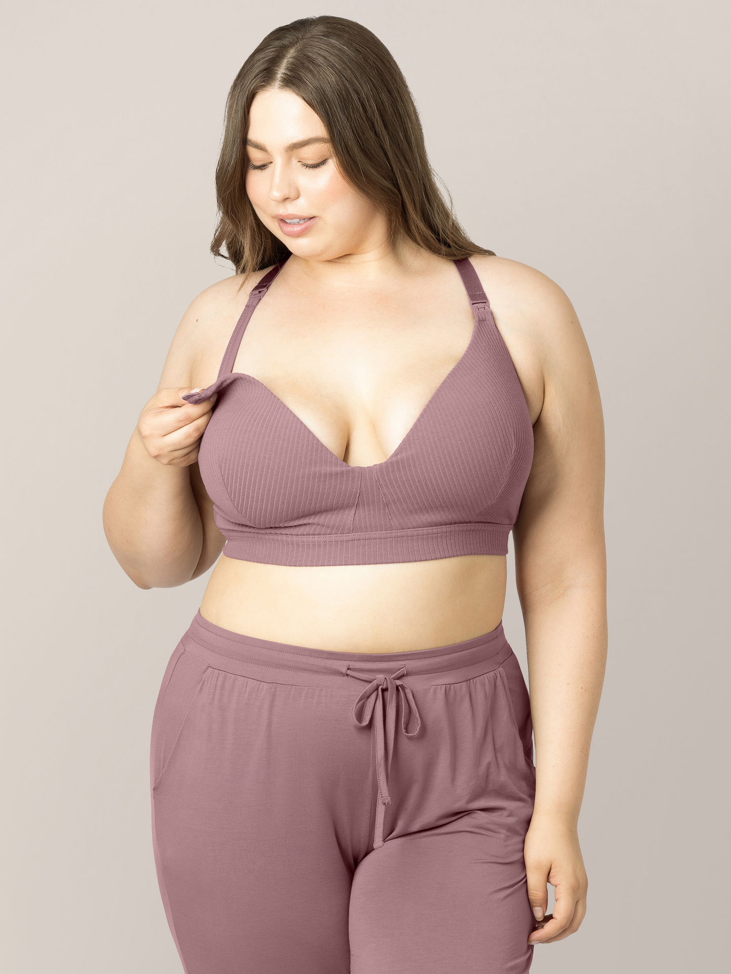 Model looking down at the RIbbed Cotton Maternity & Nursing Bra in Twilight.