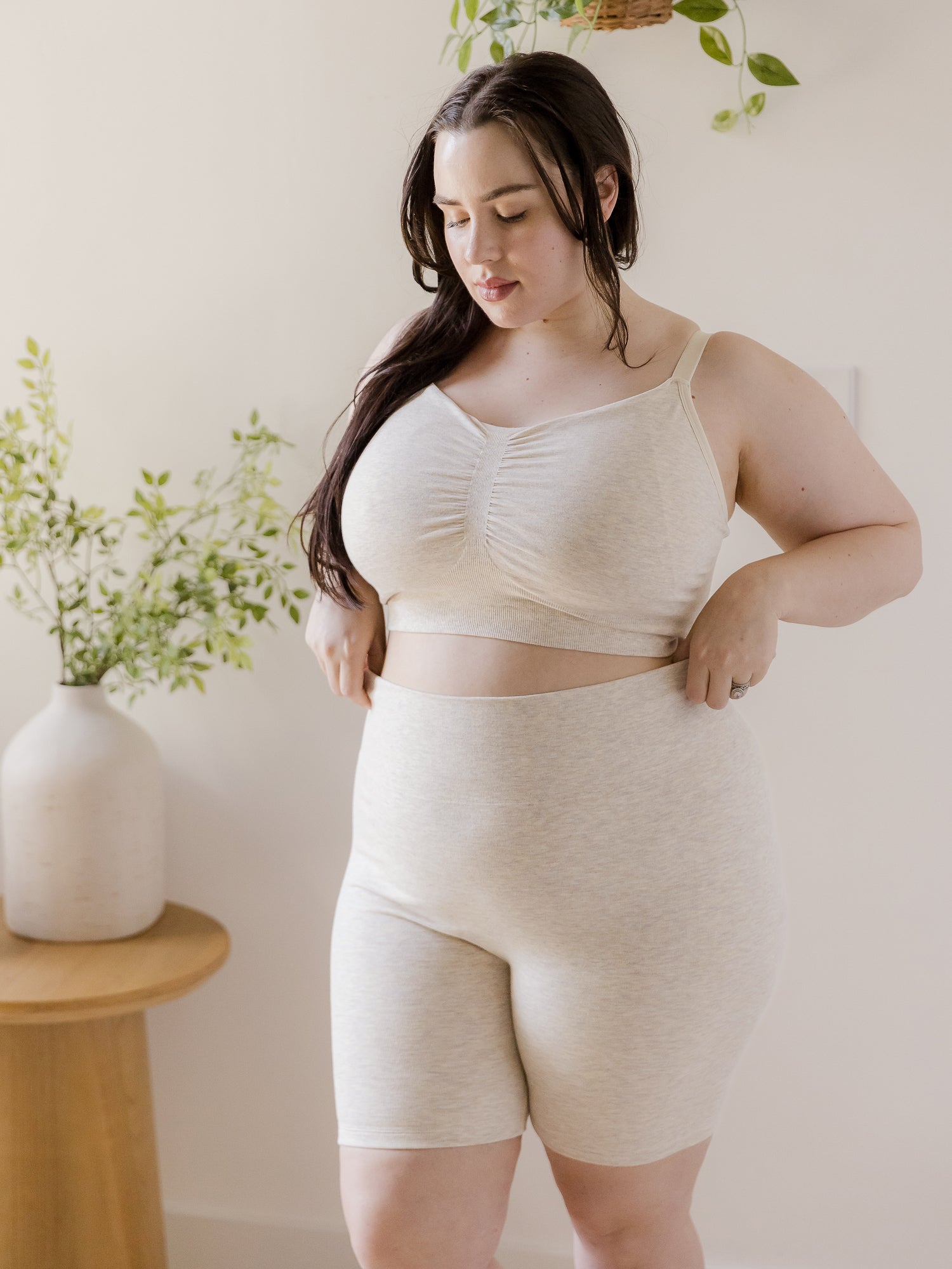 Front view of model wearing the Sublime® Bamboo Maternity & Postpartum Bike Short in oatmeal heather, paired with matching Sublime® Bamboo Hands-Free Pumping Lounge & Sleep Bra@model_info:Rachel is 5'6" and wearing an X-Large.