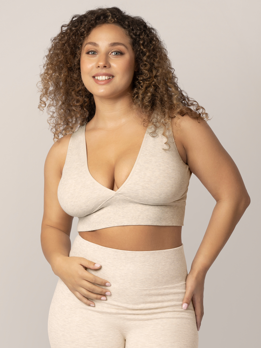 Front view of model wearing the Sublime Bamboo Maternity & Nursing Plunge Bra in Oatmeal Heather paired with the oatmeal heather Sublime Bamboo Bike Shorts.@model_info:Ceira is wearing a Large Busty.