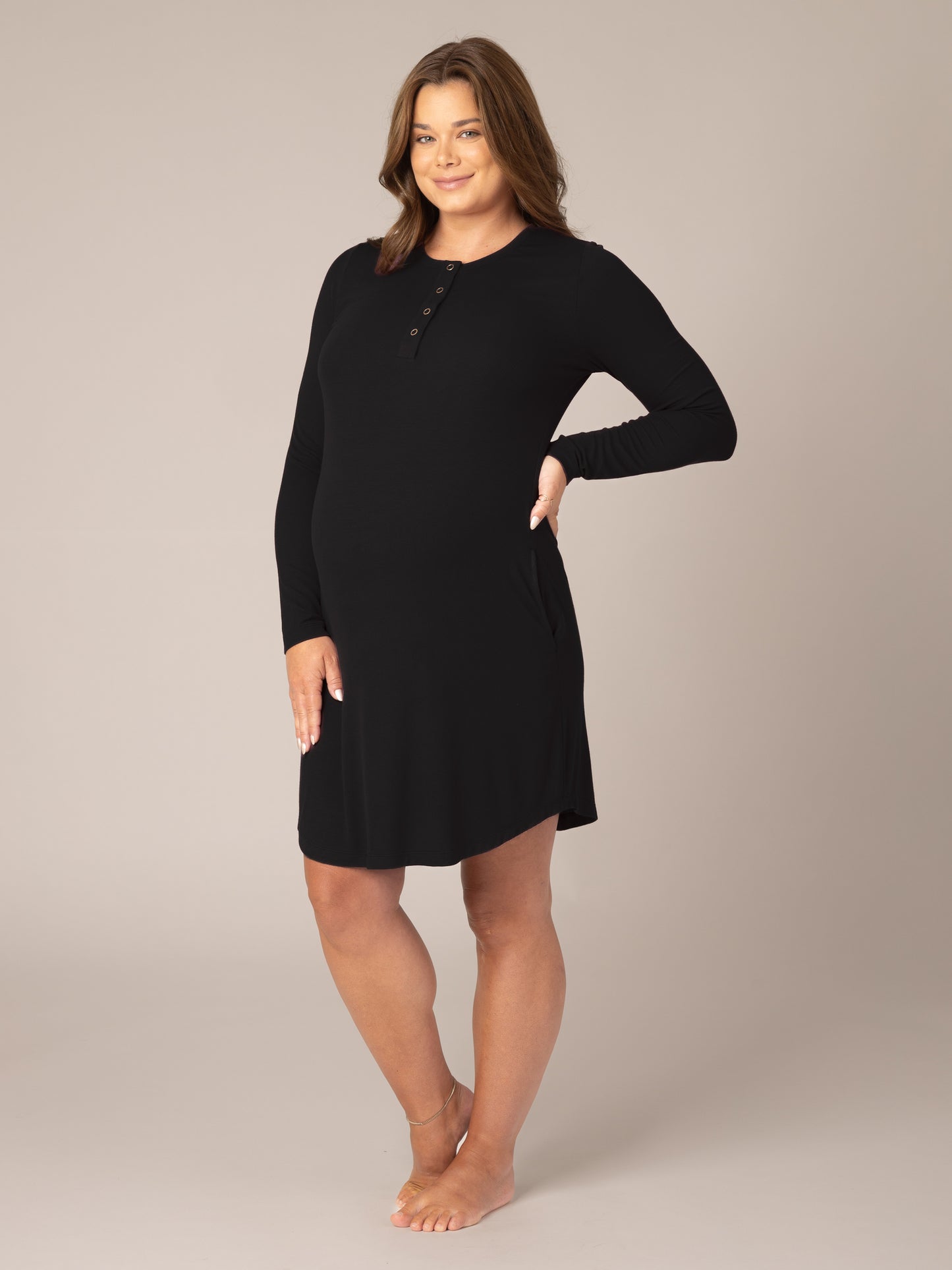 3/4 view of model wearing the Riley Ribbed Bamboo Maternity & Nursing Nightgown in Black