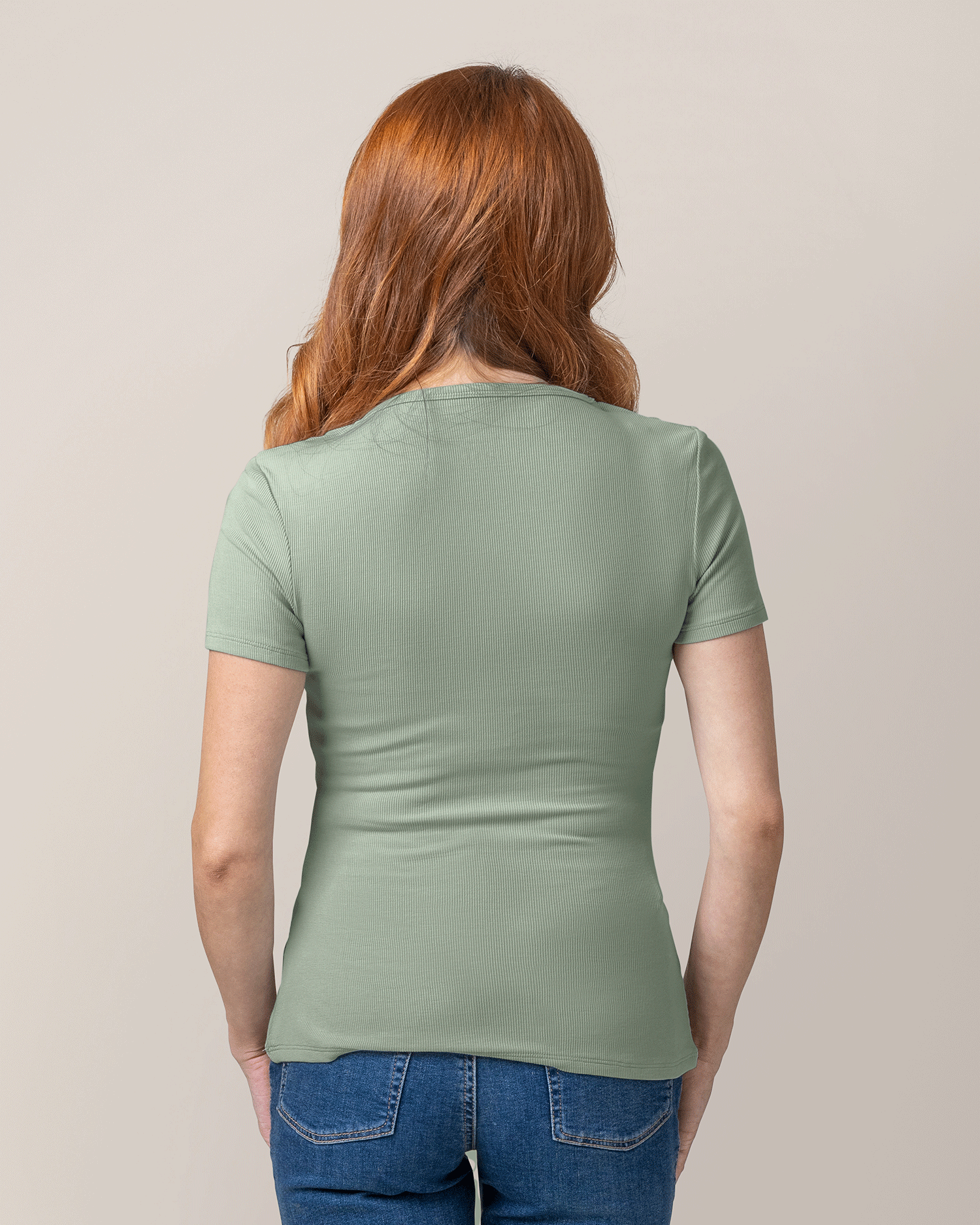 Back view of model wearing Ribbed Bamboo Crew Neck Nursing T-shirt in Aqua Mist