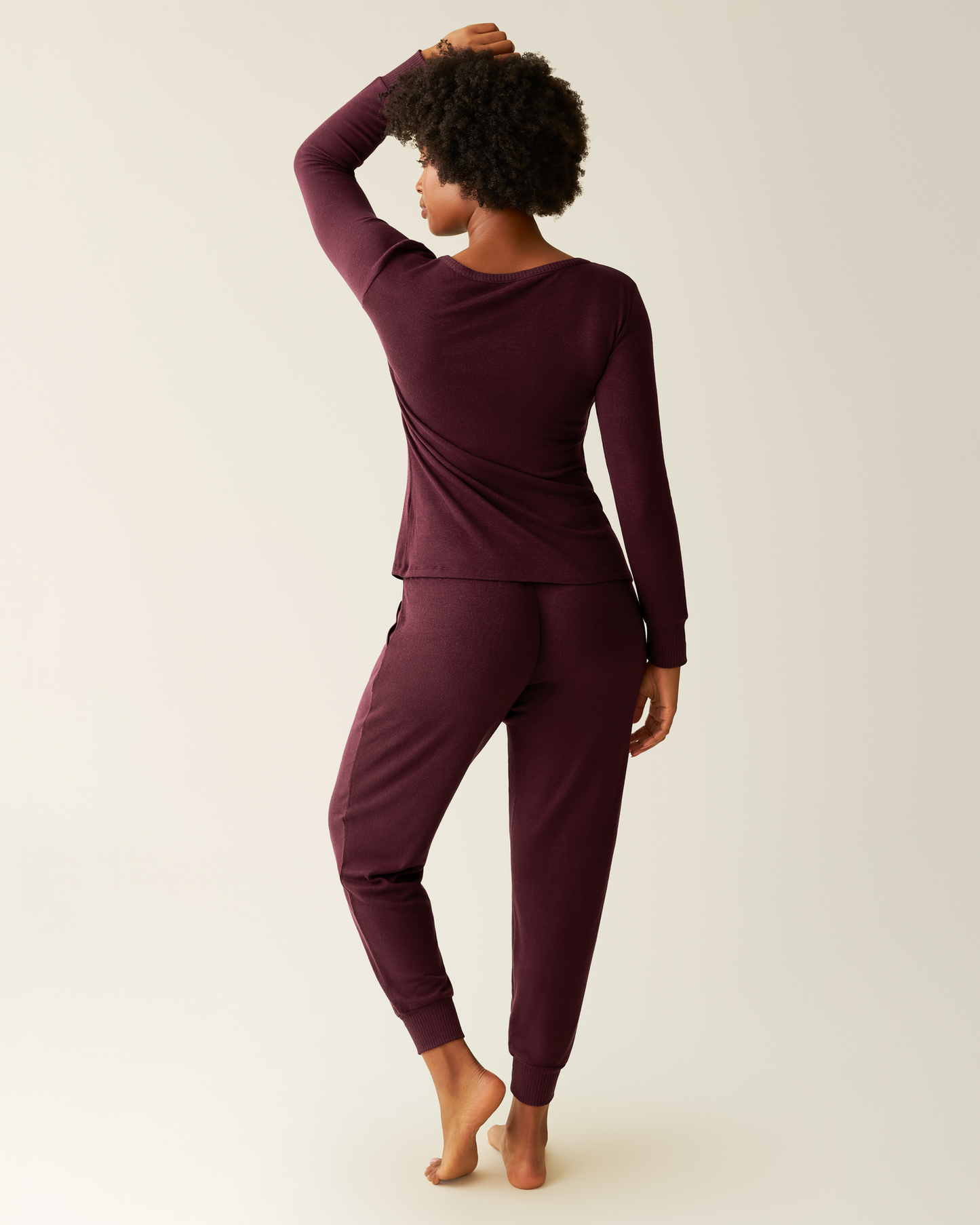 Person wearing CozyKnit Nursing Pajama & Lounge Set in Deep Burgundy on a plain background
