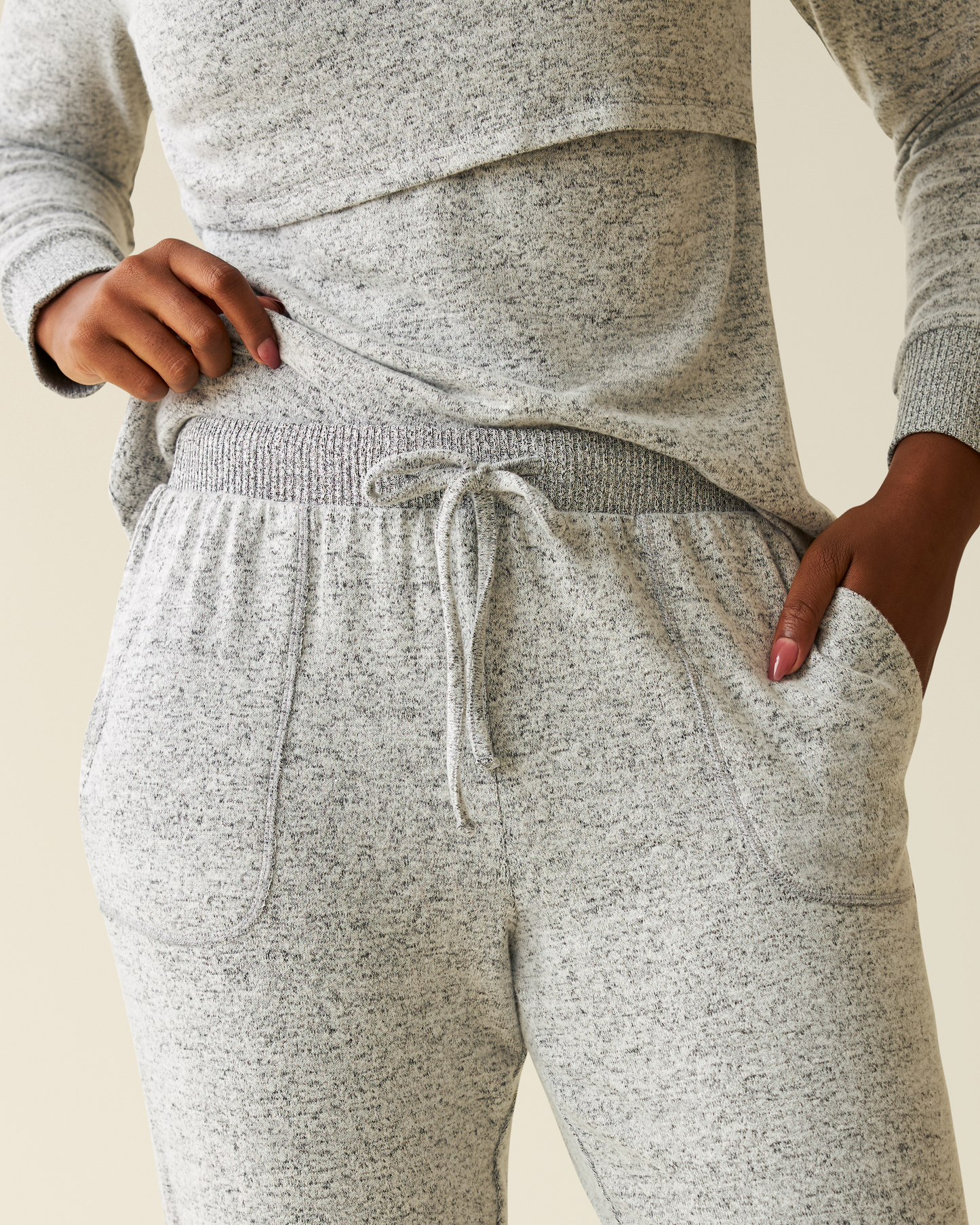 Model wearing CozyKnit Nursing Pajama & Lounge Set in Grey Heather with a drawstring on a neutral background