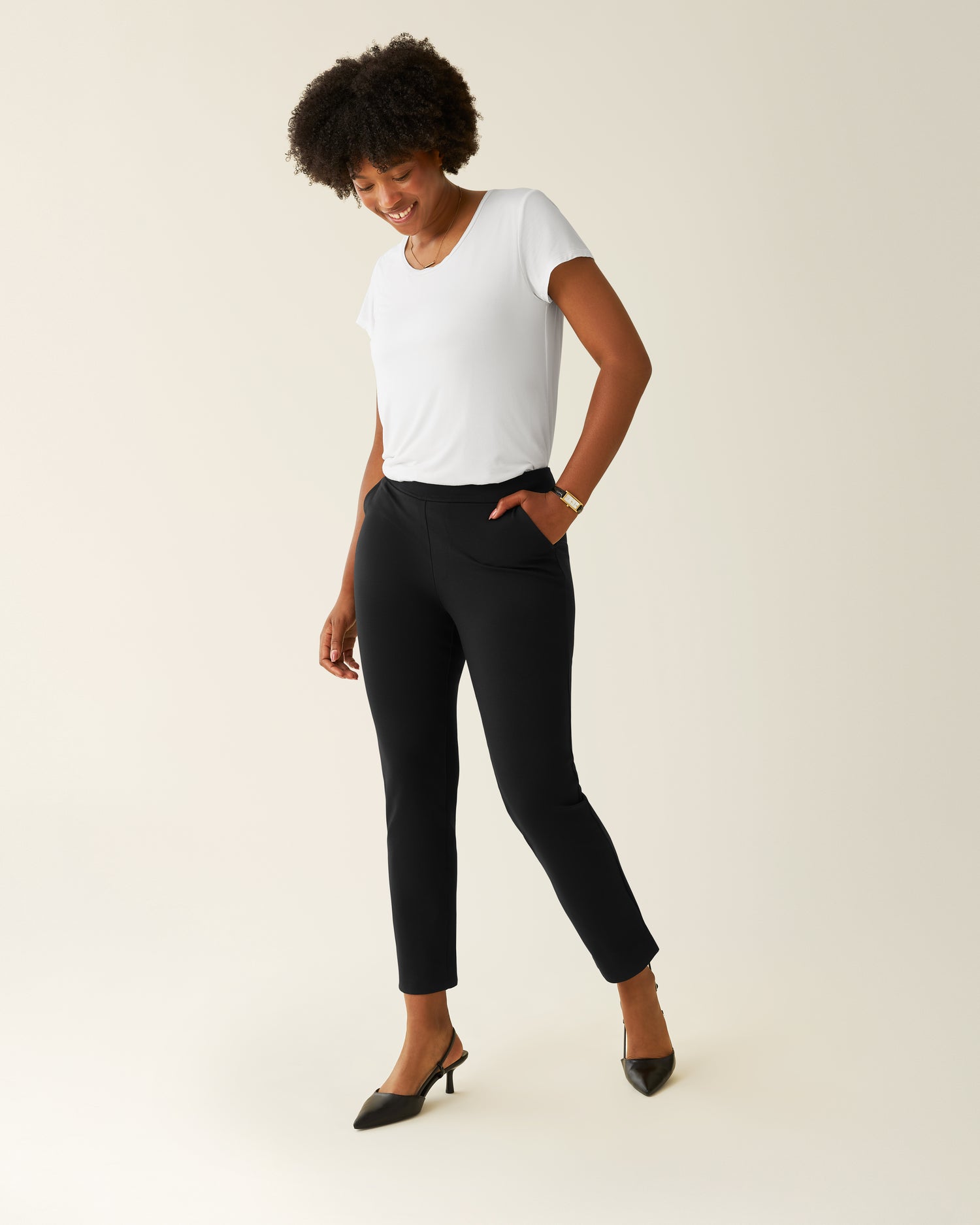 Woman wearing the Ponte Straight Leg Pant with a white top@model_info:Kyra is 5'9" and wearing a Small.