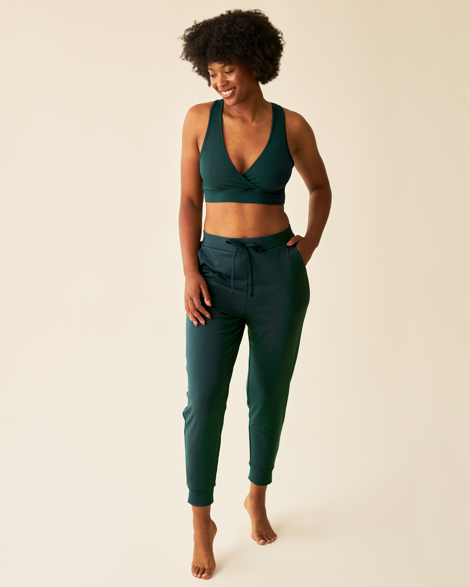 Front view of model wearing Brushed Bamboo Maternity & Postpartum Jogger in Evergreen @model_info:Kyra is 5'9" and wearing a Small.