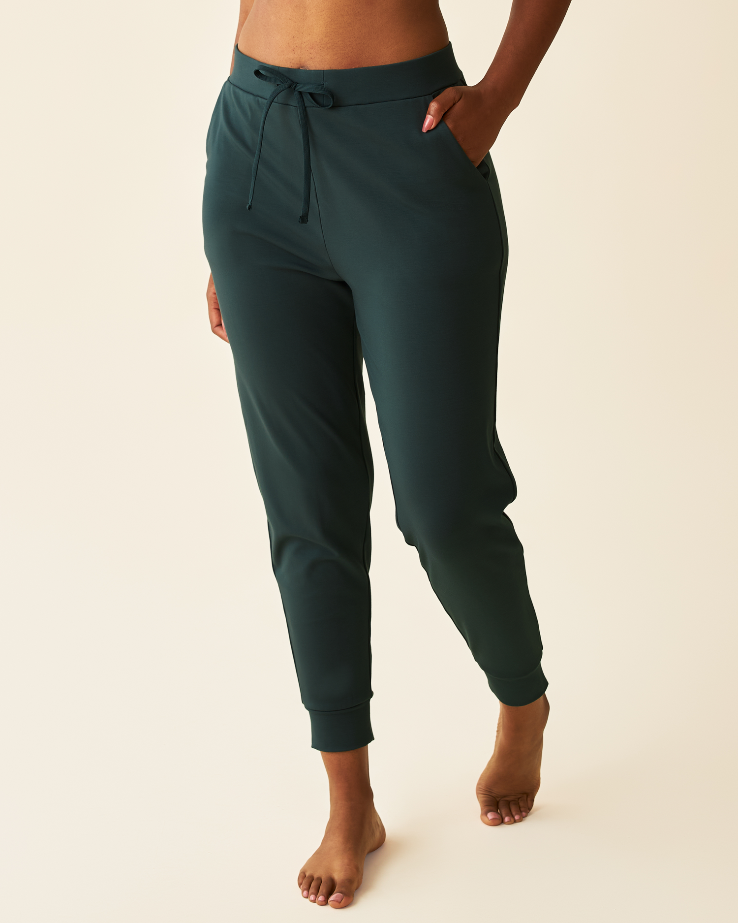 Model wearing Brushed Bamboo Maternity & Postpartum Jogger in Evergreen