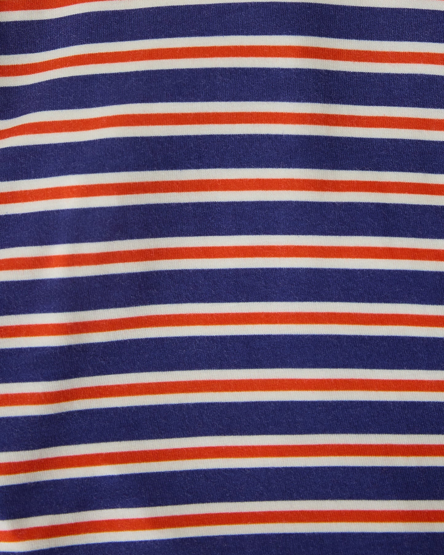 Close up of pattern of Bamboo Baby Two-Piece Pajama Set in Preppy Stripe on a beige background