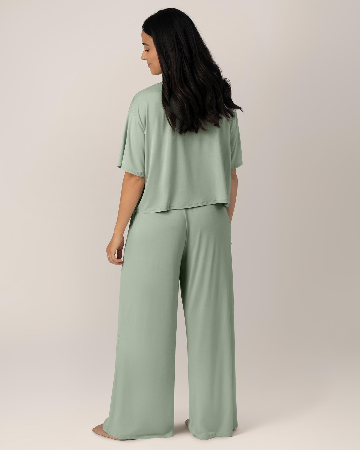 Back view of model wearing the Aria Bamboo Casual Lounge Pant in Aqua Mist paired with matching Aria Bamboo Casual Cropped short Sleeve Top