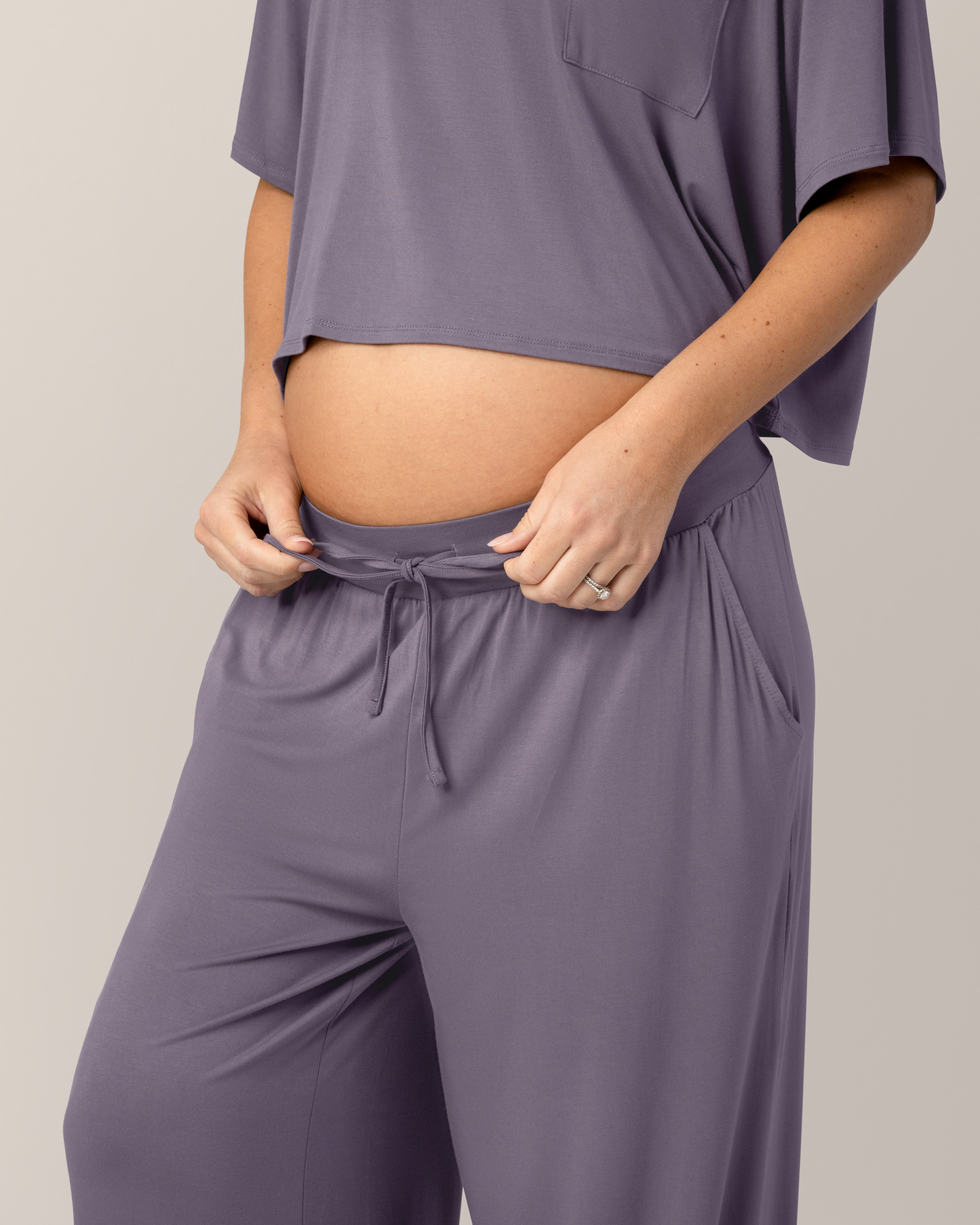 Close up of waistband and drawstring detail on the Aria Bamboo Casual Lounge Pant in Granite, on model, paired with matching Aria Bamboo Casual Cropped Short Sleeve Top