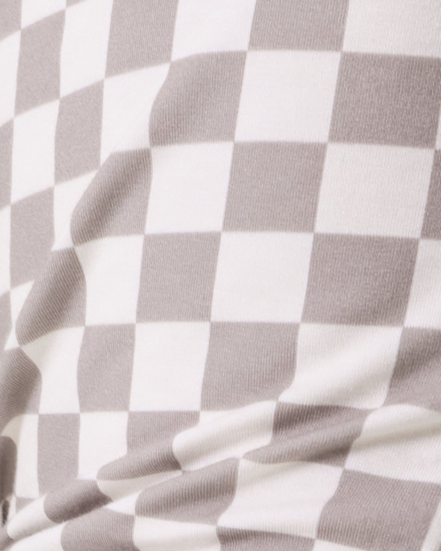 Close up of Baby wearing the Bamboo Baby Two-Piece Pajama Set in Taupe Checker print
