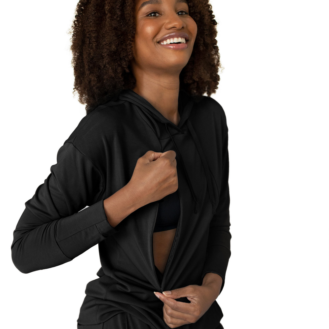 Model wearing the Bamboo Nursing Hoodie in Black showing the nursing panel. @model_info:Elaina is wearing a Small.