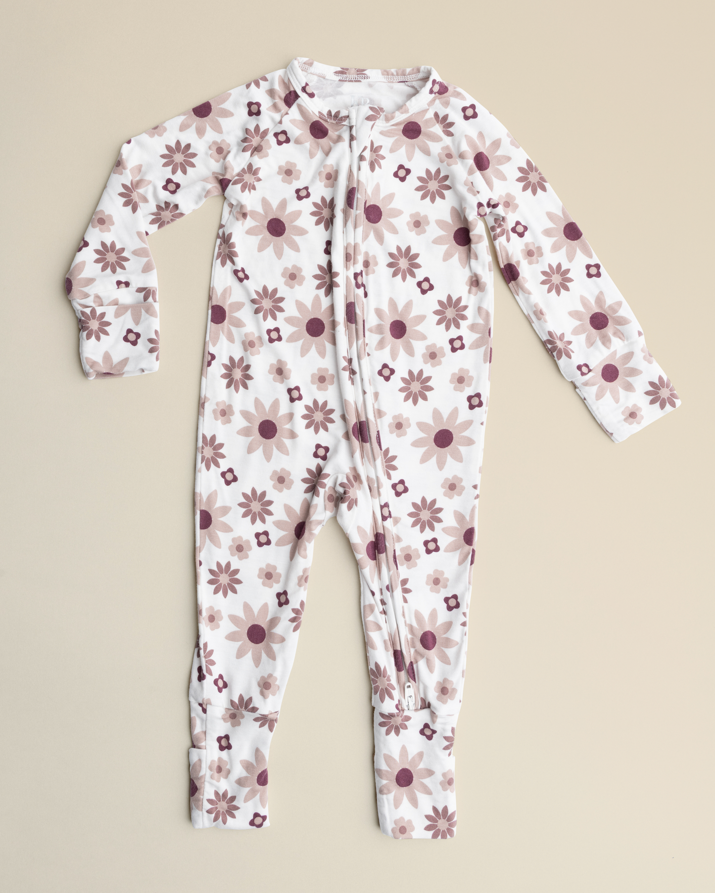 Bamboo Baby Pajamas in Twilight Floral on a beige background