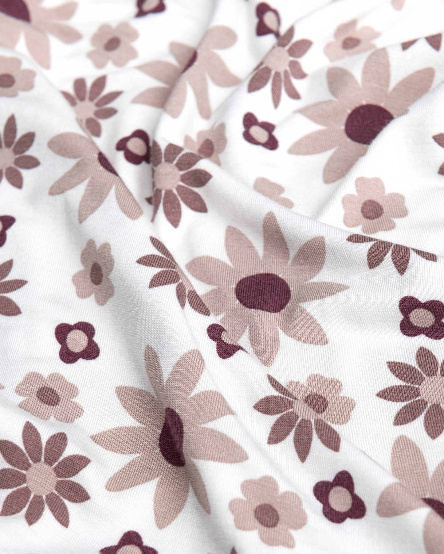Close-up of Bamboo Knotted Baby Gown in Twilight Floral