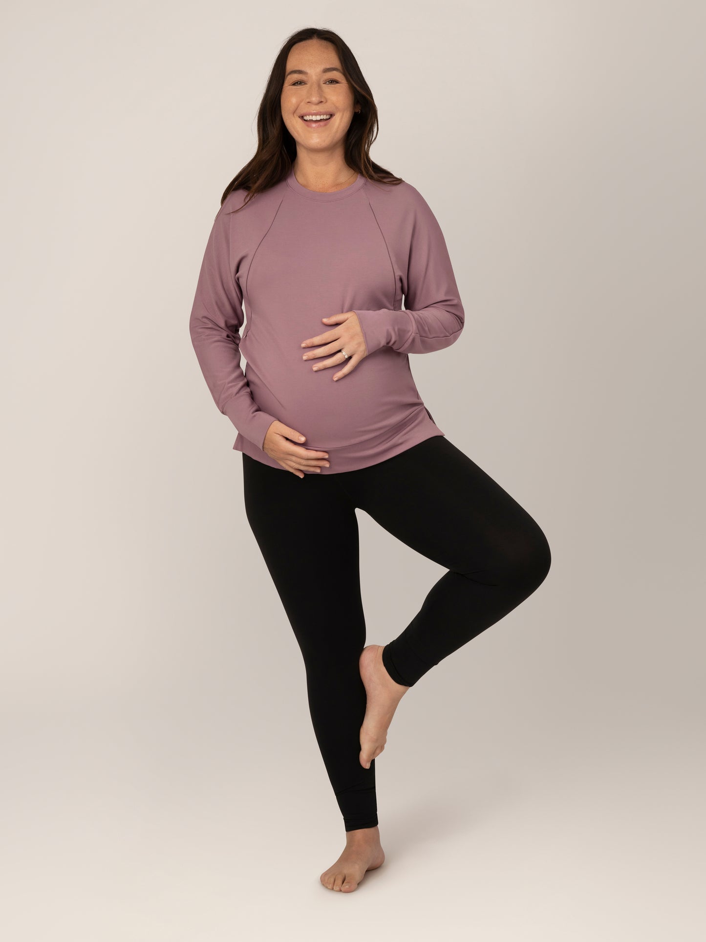 Full body view of pregnant model wearing the Bamboo Maternity & Nursing Crew Neck Sweatshirt in Twilight, paired with the Louisa Leggings.