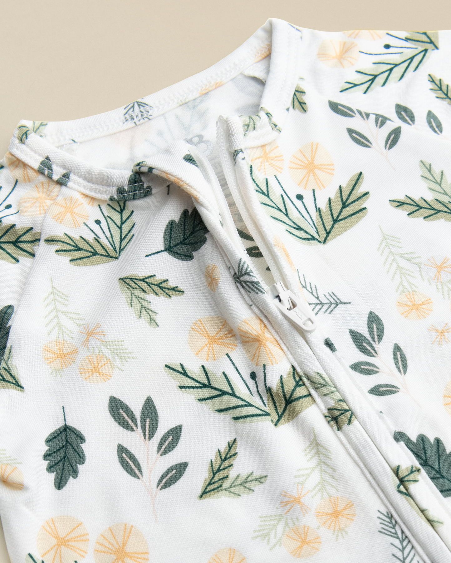 Close-up of Bamboo Baby Pajamas in Honey Dandelion