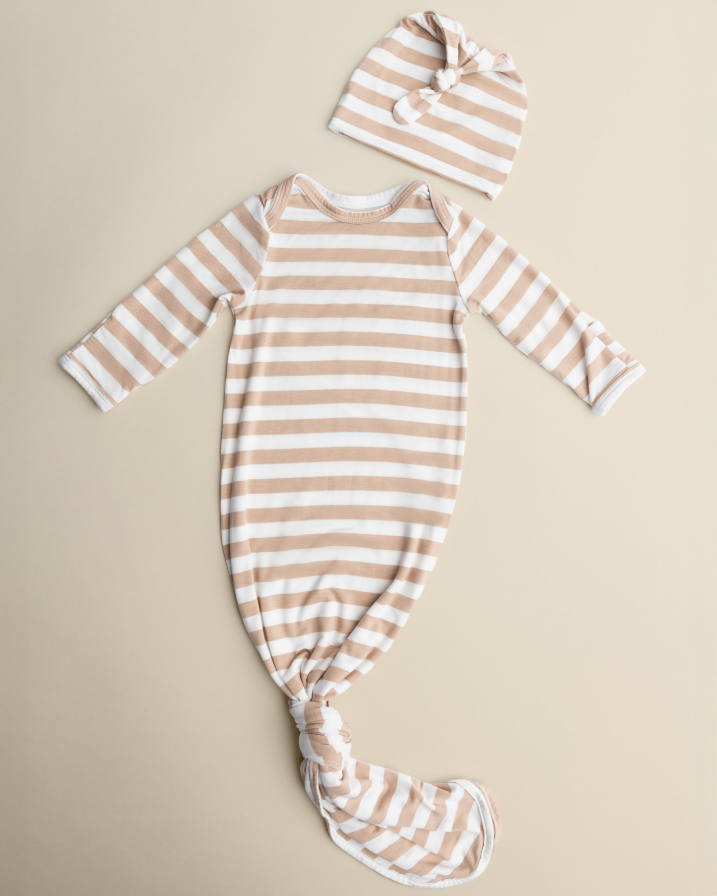 Bamboo Knotted Baby Gown in Fawn Stripe on a beige background