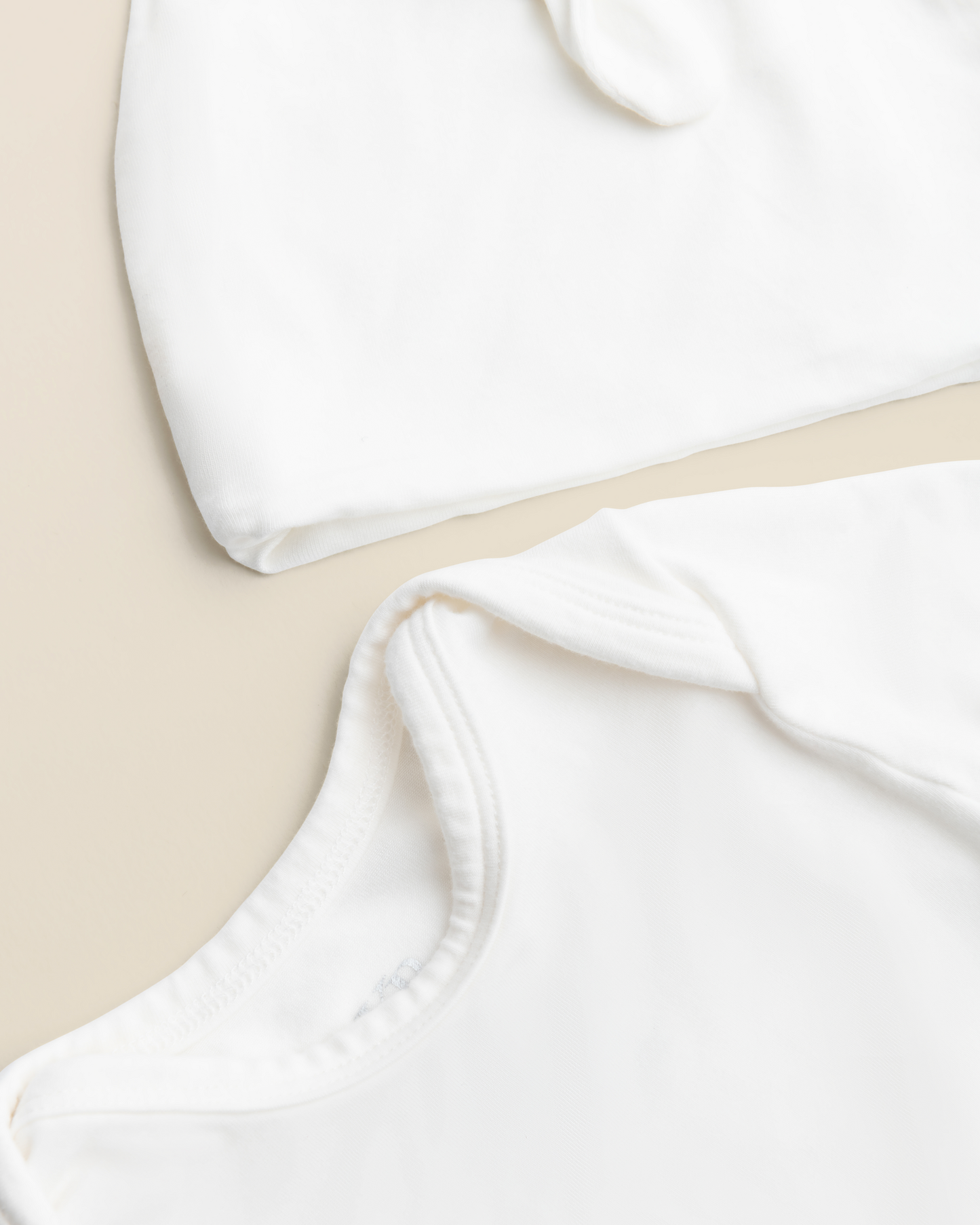 Close up of Bamboo Knotted Baby Gown in Pearl