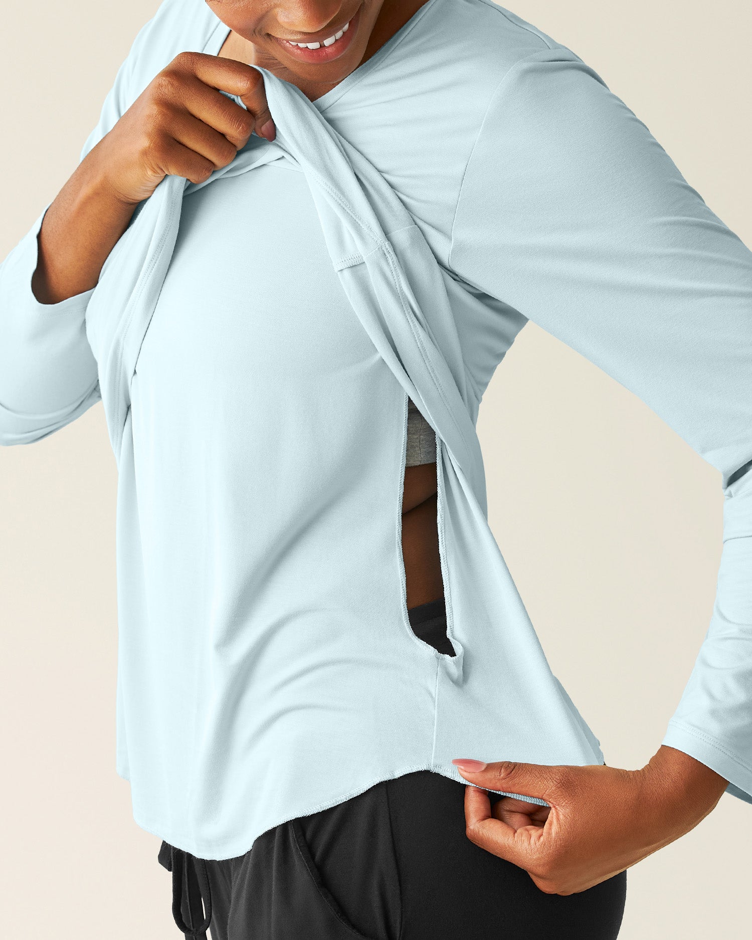Woman wearing the Bamboo Maternity & Nursing Long Sleeve T-shirt in Powder Blue, showing hidden nursing access