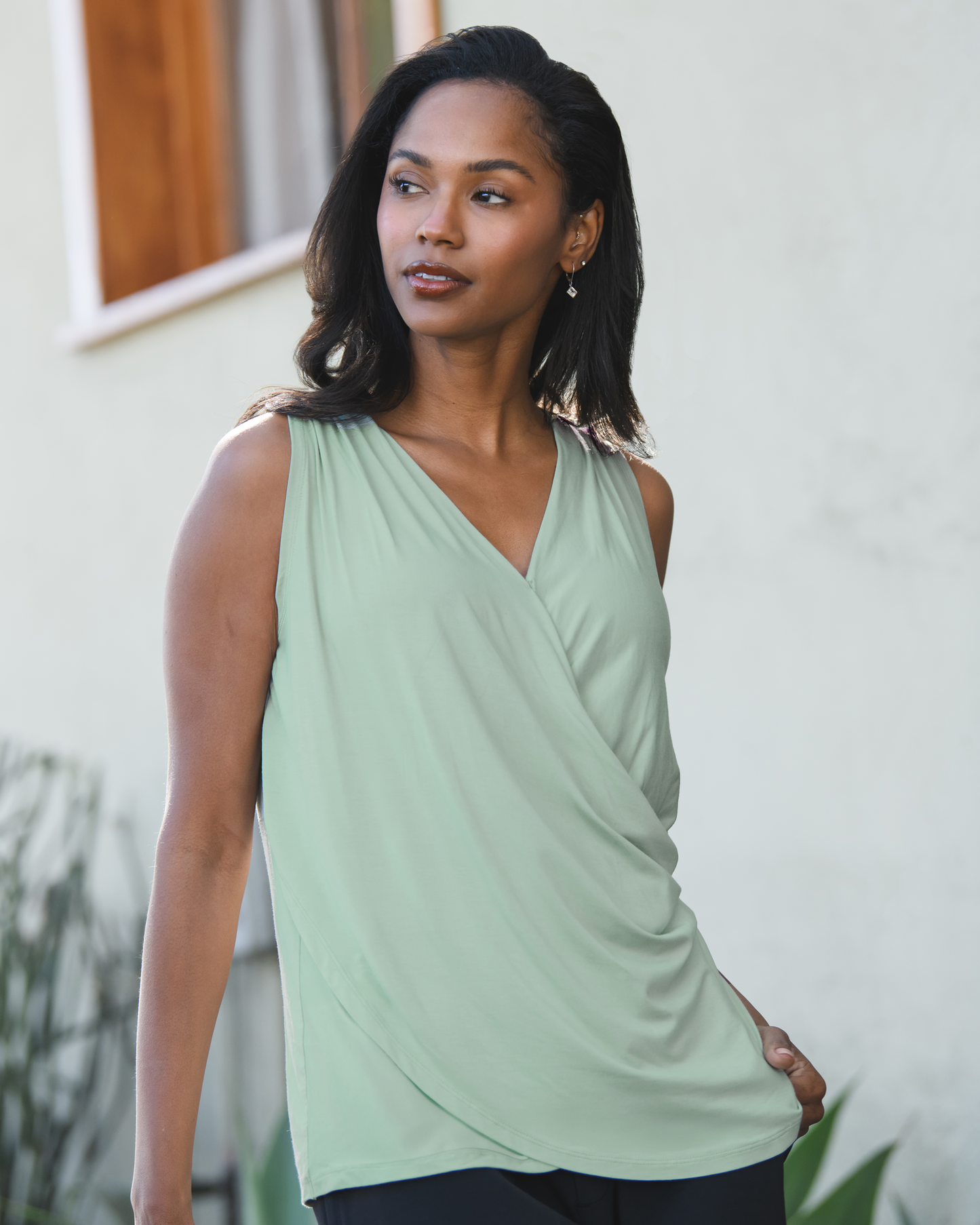 Front view of model wearing the Bamboo Draped Nursing Tank in Aqua Mist
