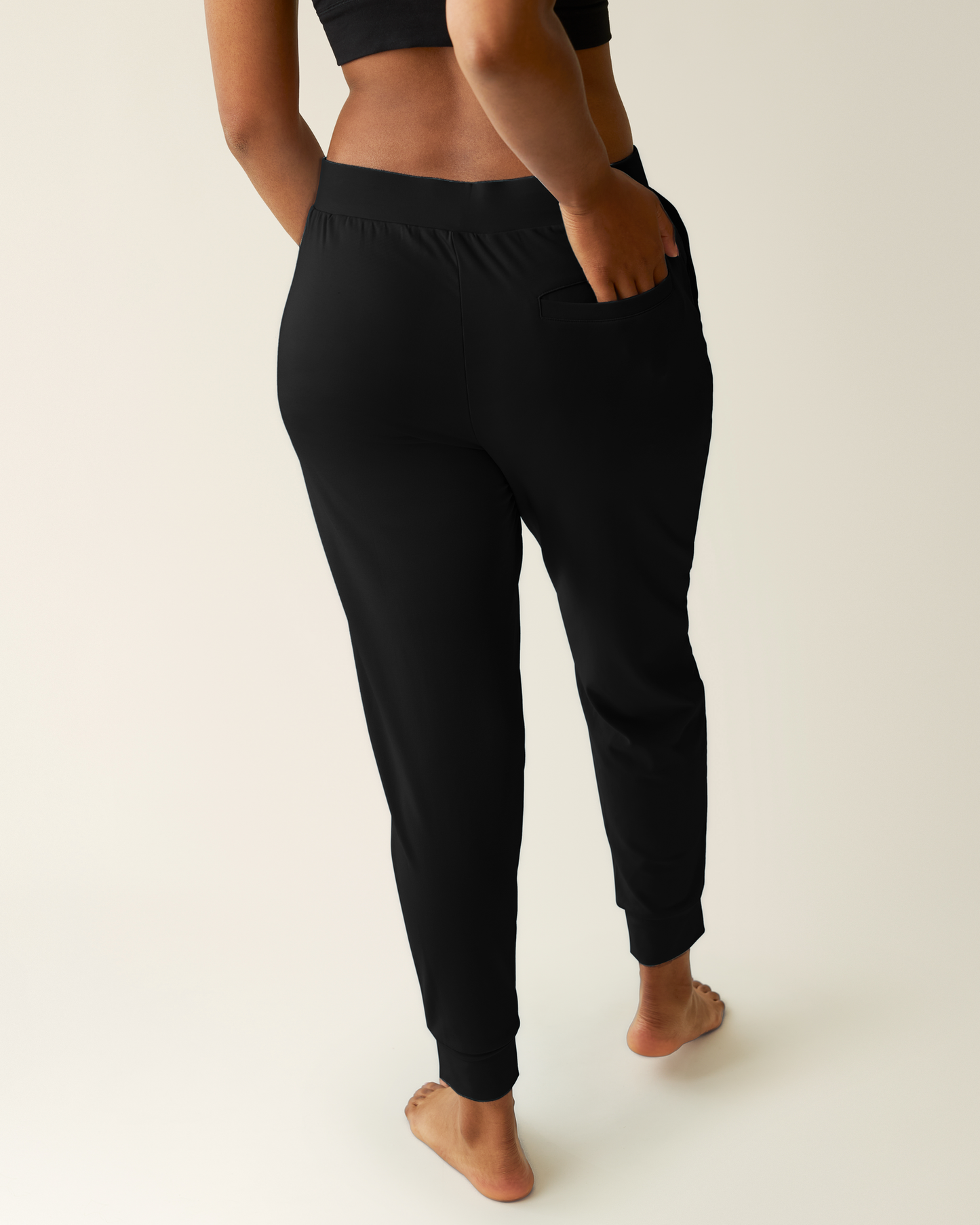 Back view of model wearing Brushed Bamboo Maternity & Postpartum Jogger in Black