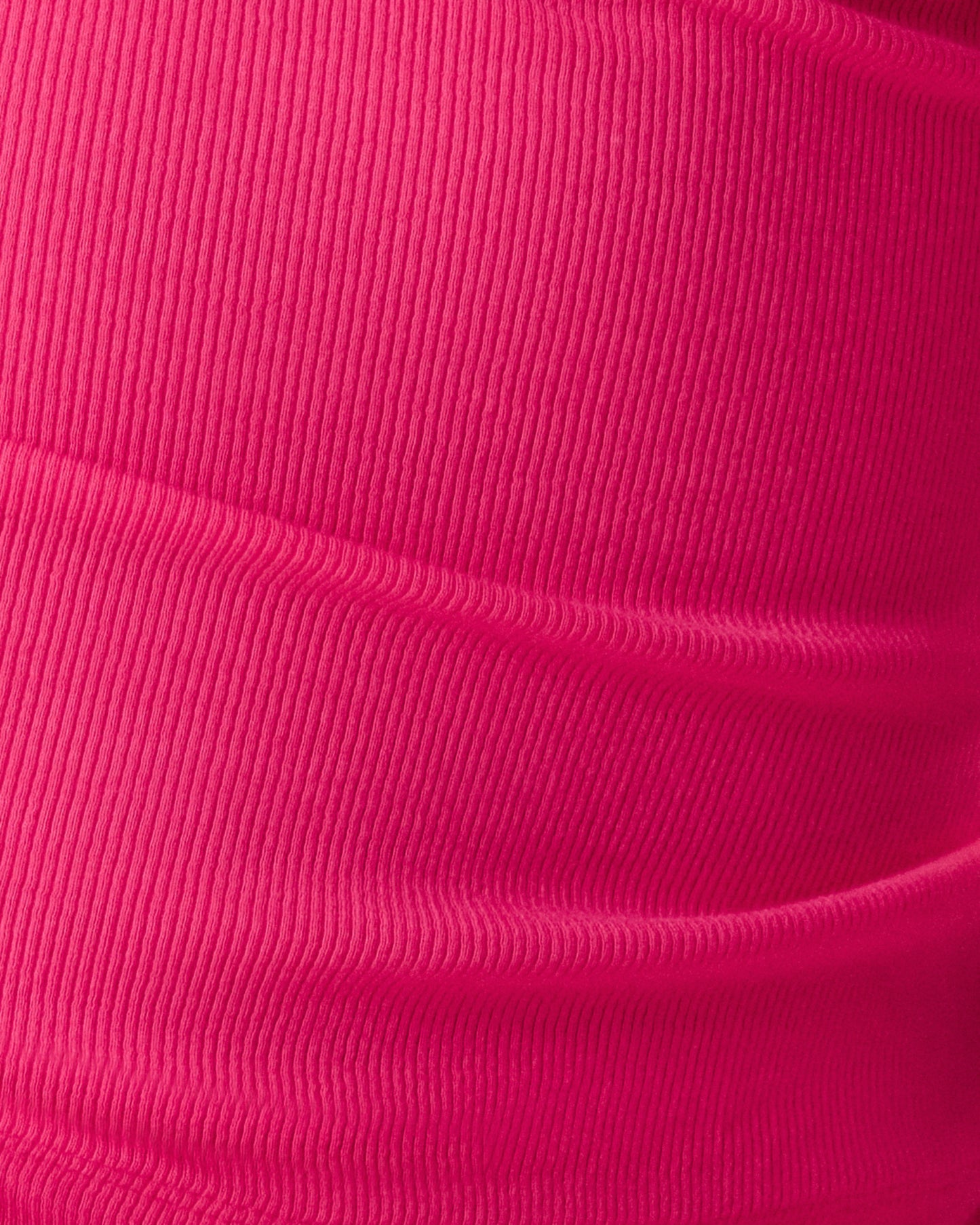 Close up of the Ribbed Bamboo Racerback Nursing Tank in Raspberry Pink
