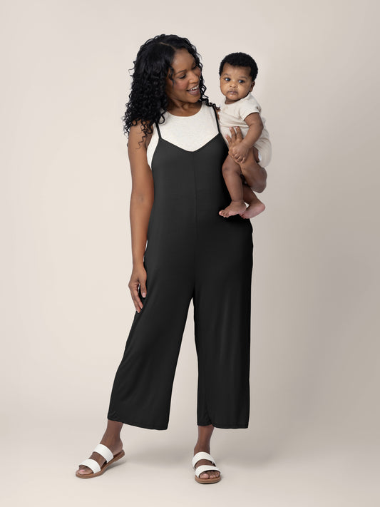 Model wearing the Charlie Maternity & Postpartum romper in black @model_info:Rashé is 5'6" and wearing a Small.