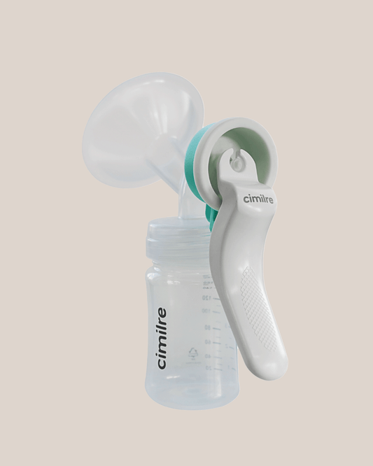 Cimilre - M1 Manual Breast Pump Handle, shown with shield and bottle | Kindred Bravely