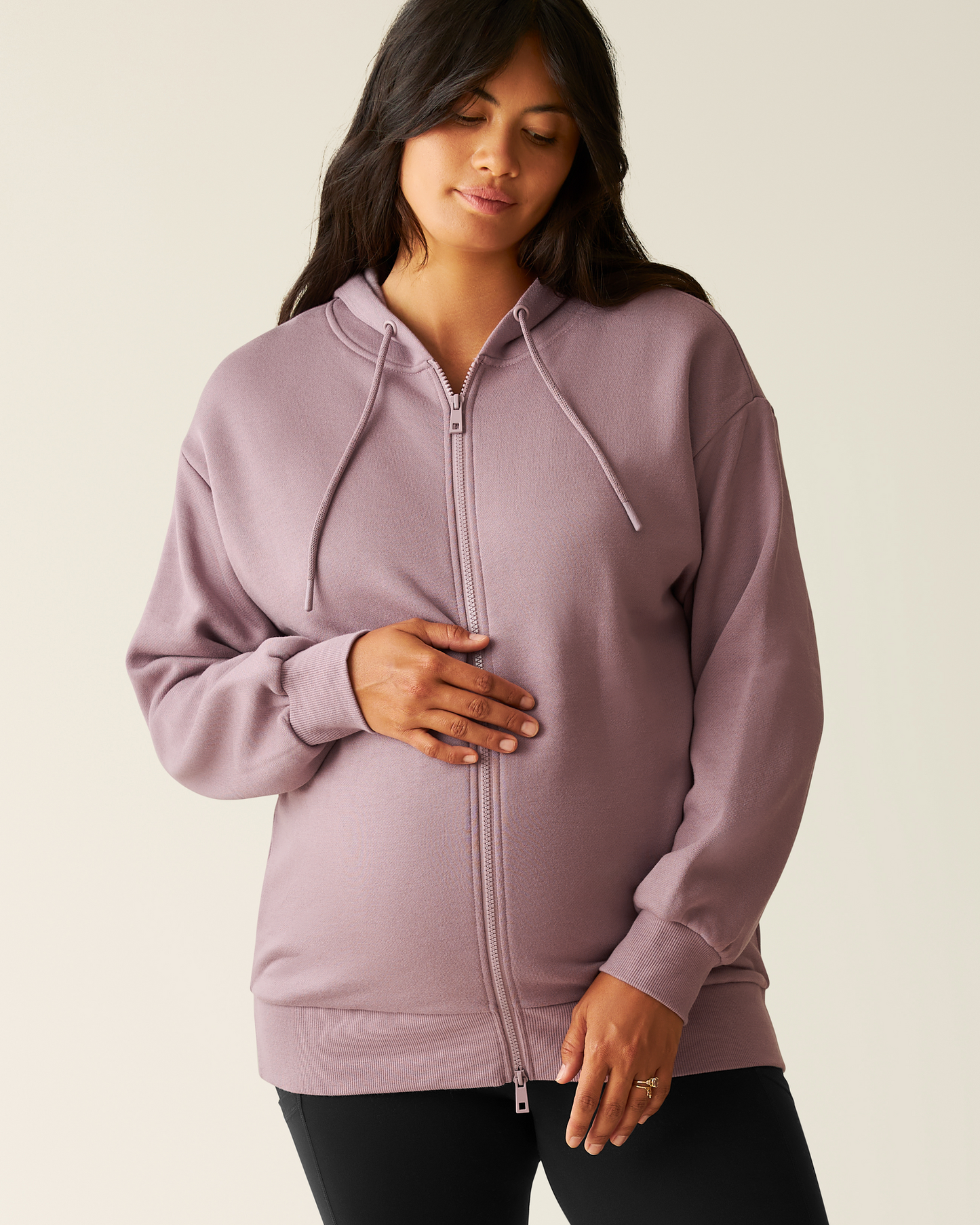 Woman wearing the Cloud Fleece Oversized Hoodie in Dusty Mauve @model_info:Zoe is wearing a Medium.