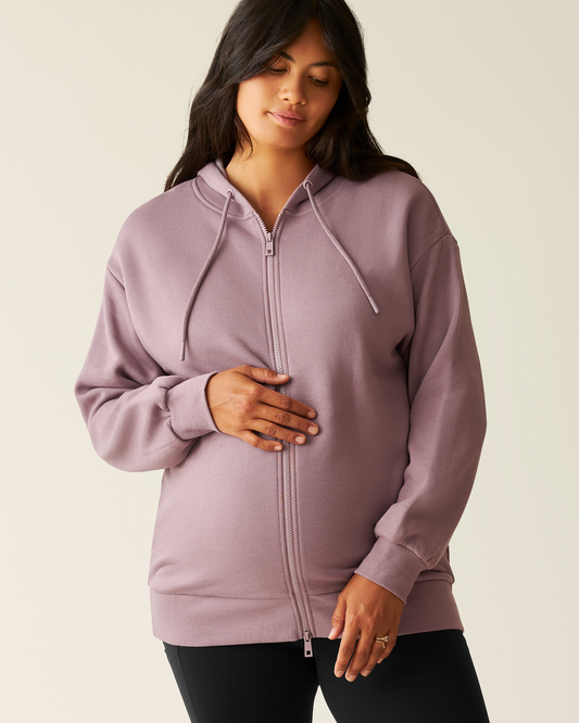 Woman wearing the Cloud Fleece Oversized Hoodie in Dusty Mauve @model_info:Zoe is wearing a Medium.