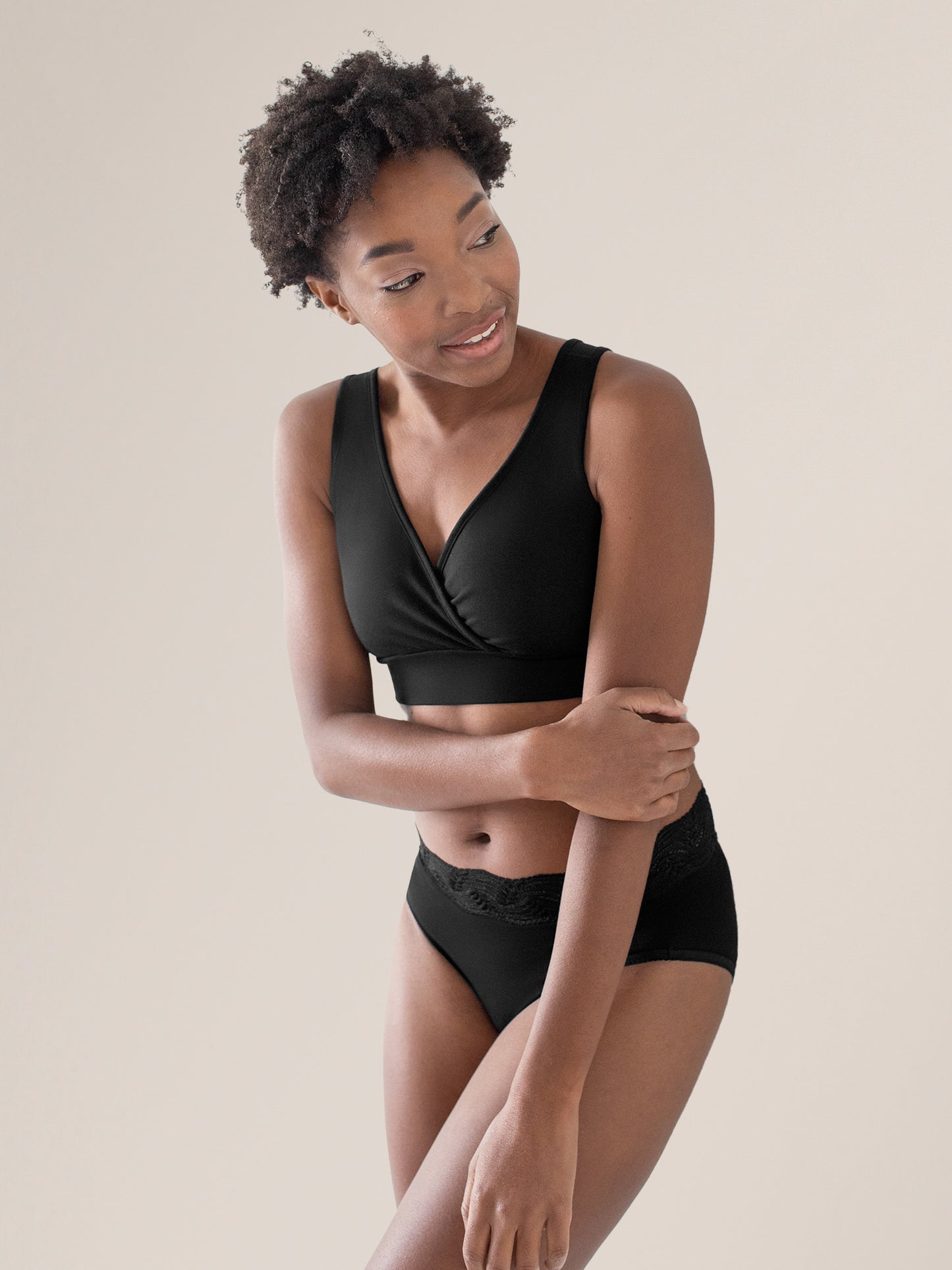 Model wearing the Organic Cotton Sleep & Nursing Bra in Black