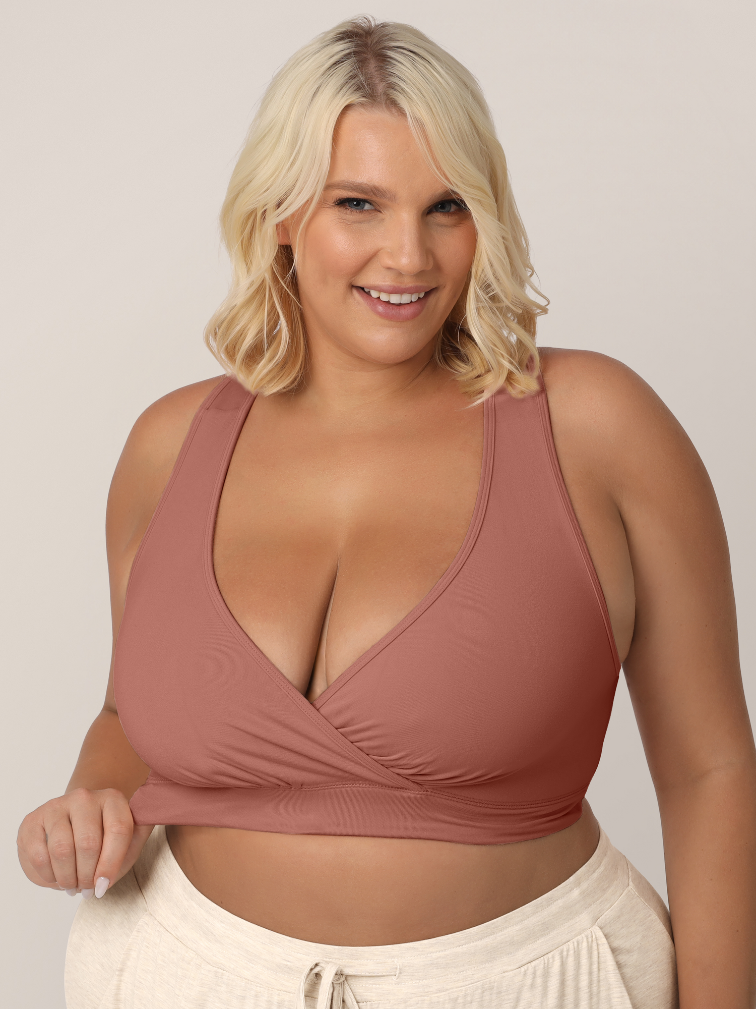 Busty model wearing the French Terry Nursing Bra in Redwood. 