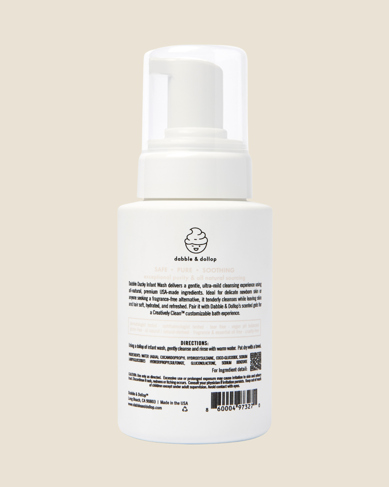 Back of white bottle of Dabble & Dollop Dabble Ducky infant wash product on a beige background