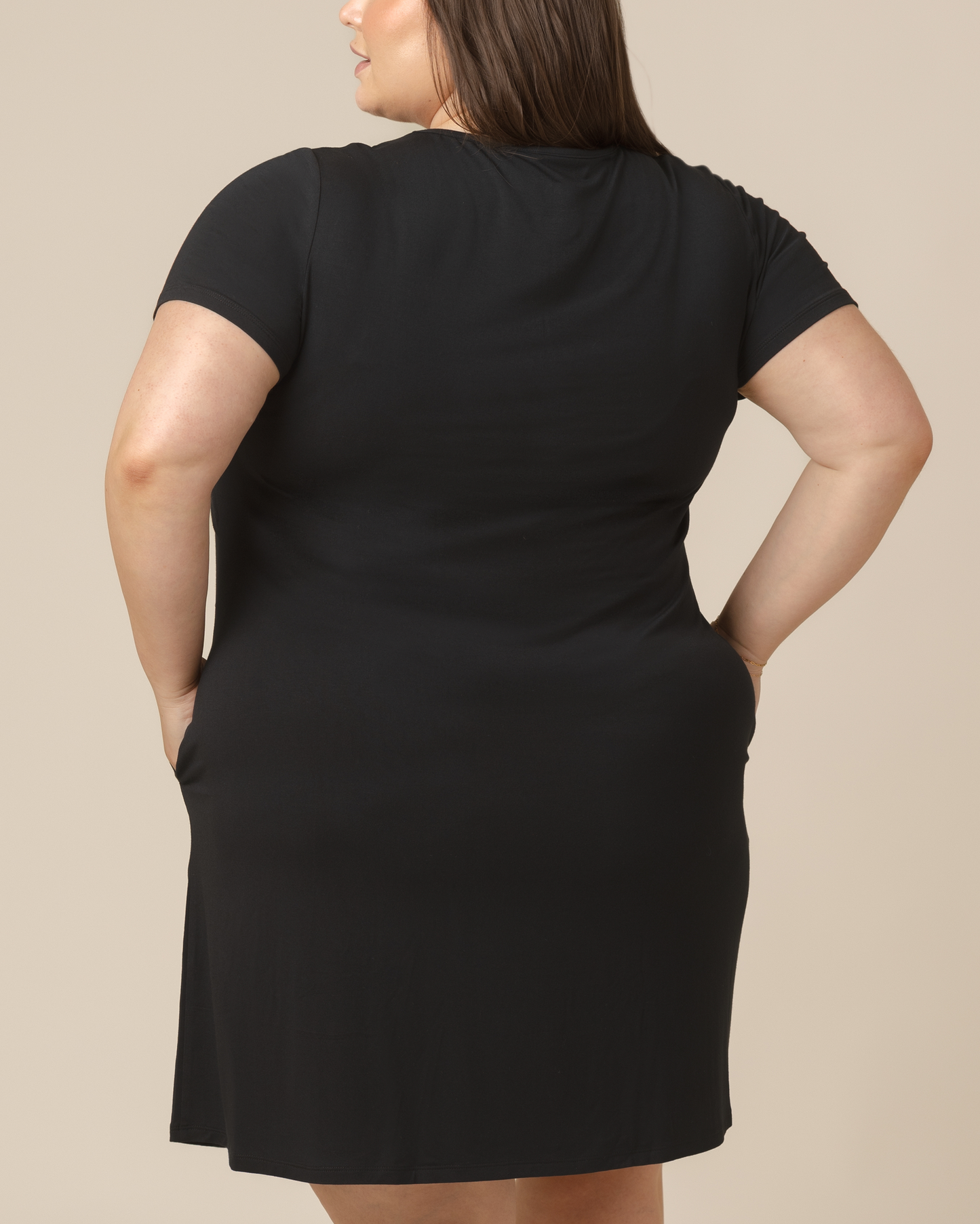 Back view of model wearing the Eleanora Bamboo Maternity & Nursing Dress in Black