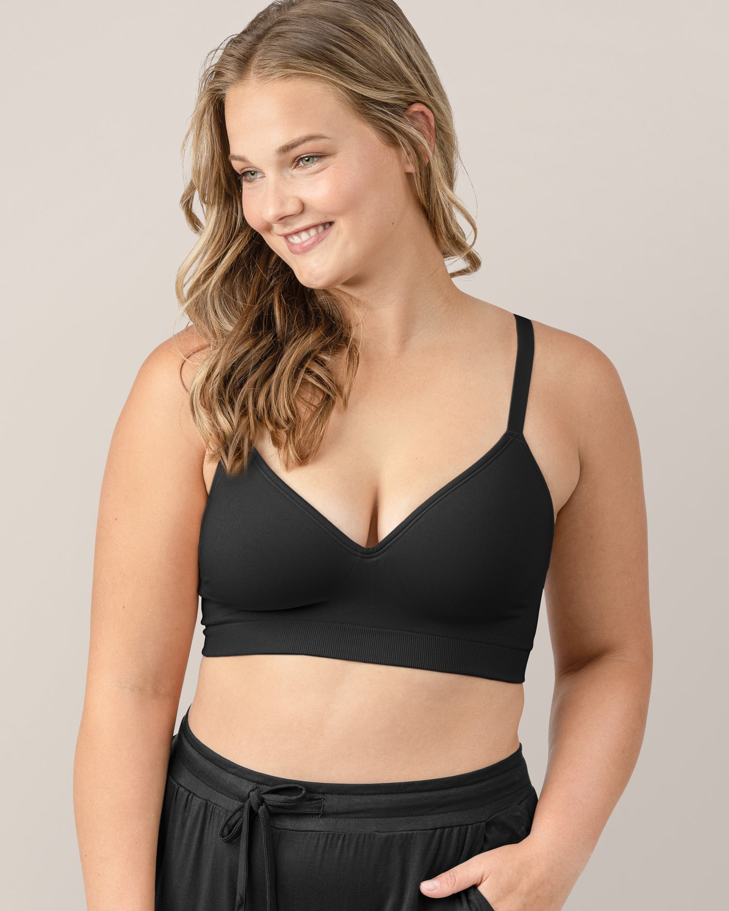 Front view of woman wearing the Everly Wireless Contour Bra in Black. @model_info:Myla is wearing a Medium.