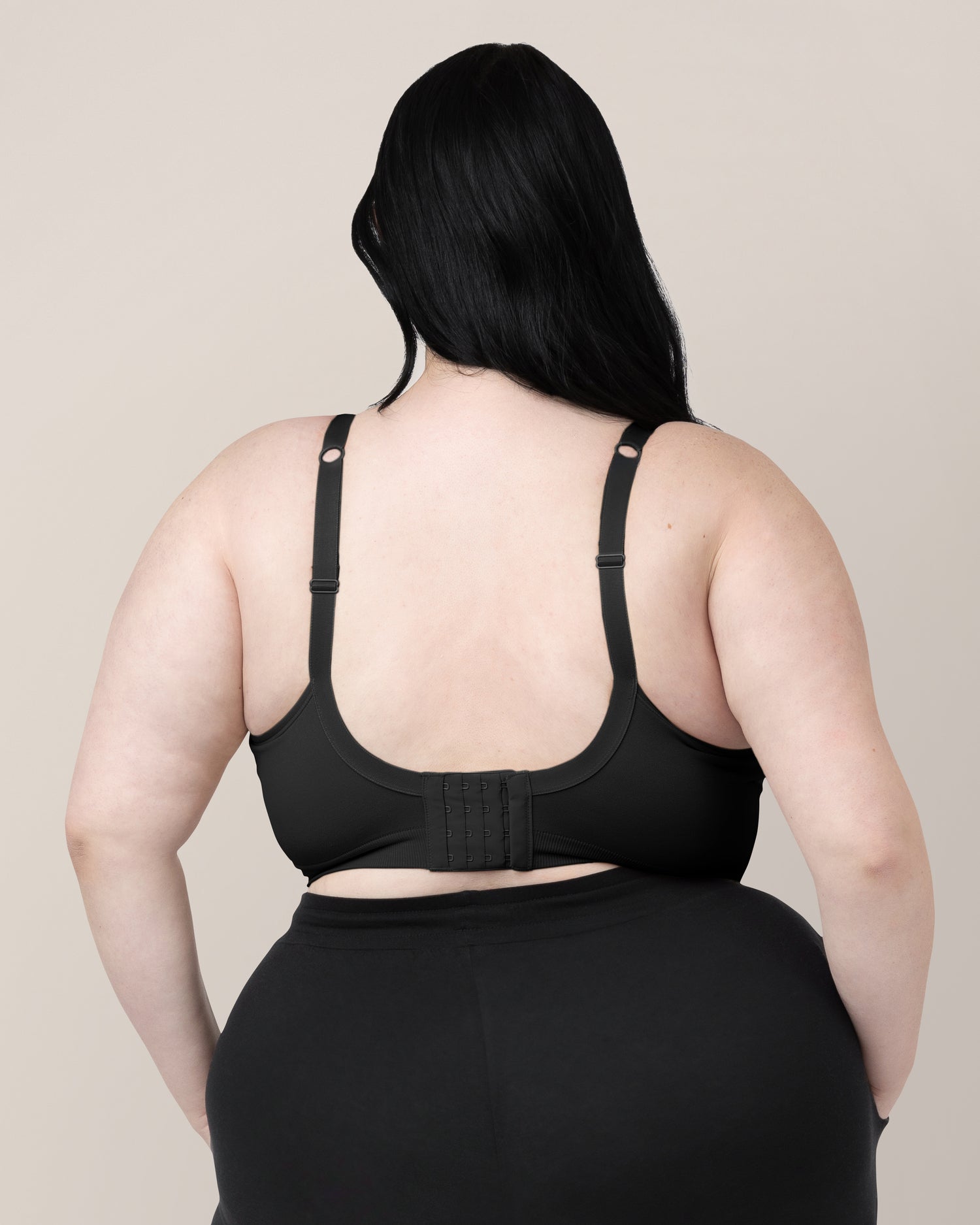 Back view of woman wearing the Everly Wireless Contour Bra in Black.