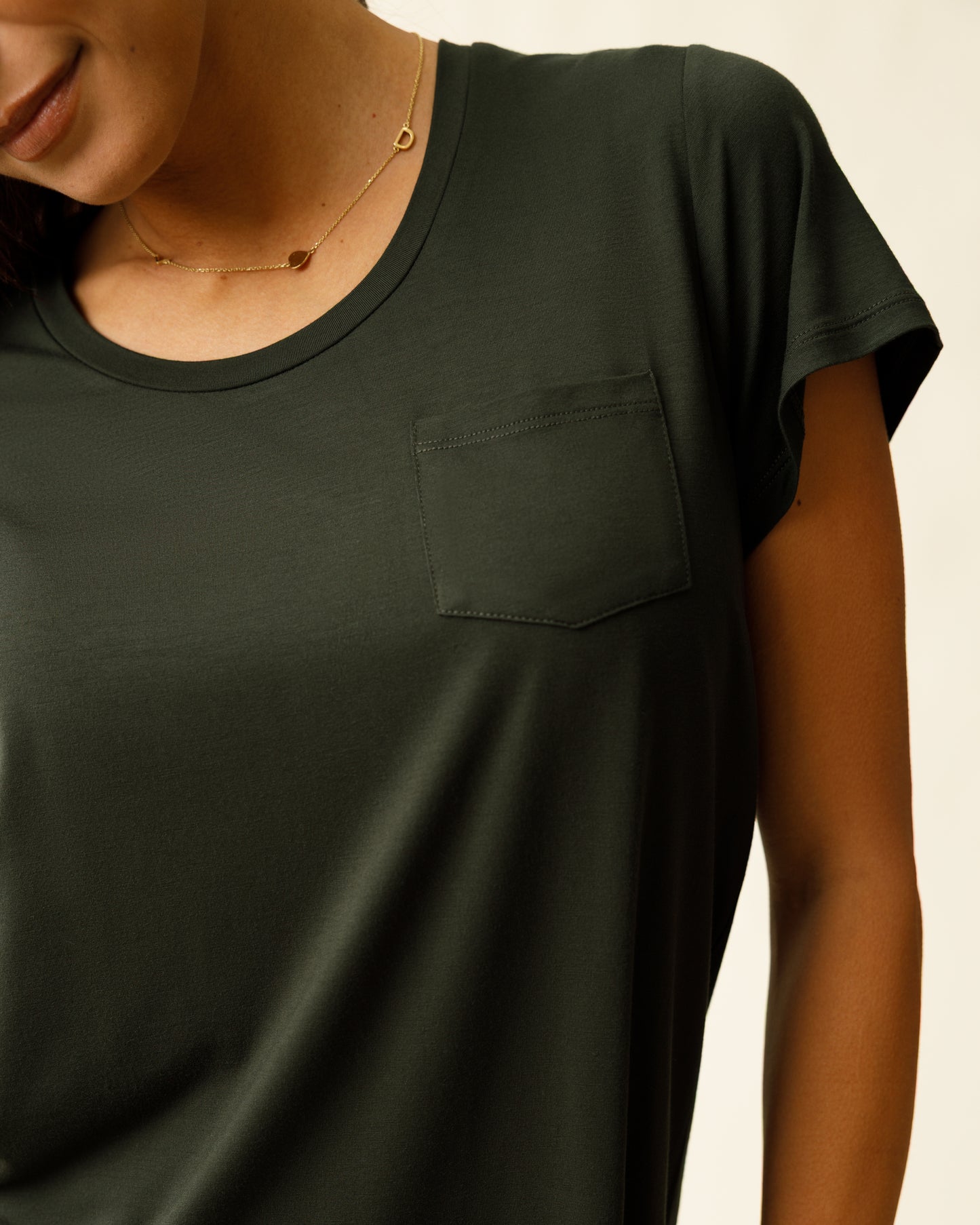 Woman wearing the Woman wearing the Everyday Maternity & Nursing T-shirt in Thyme, showing neckline and pocket detail.