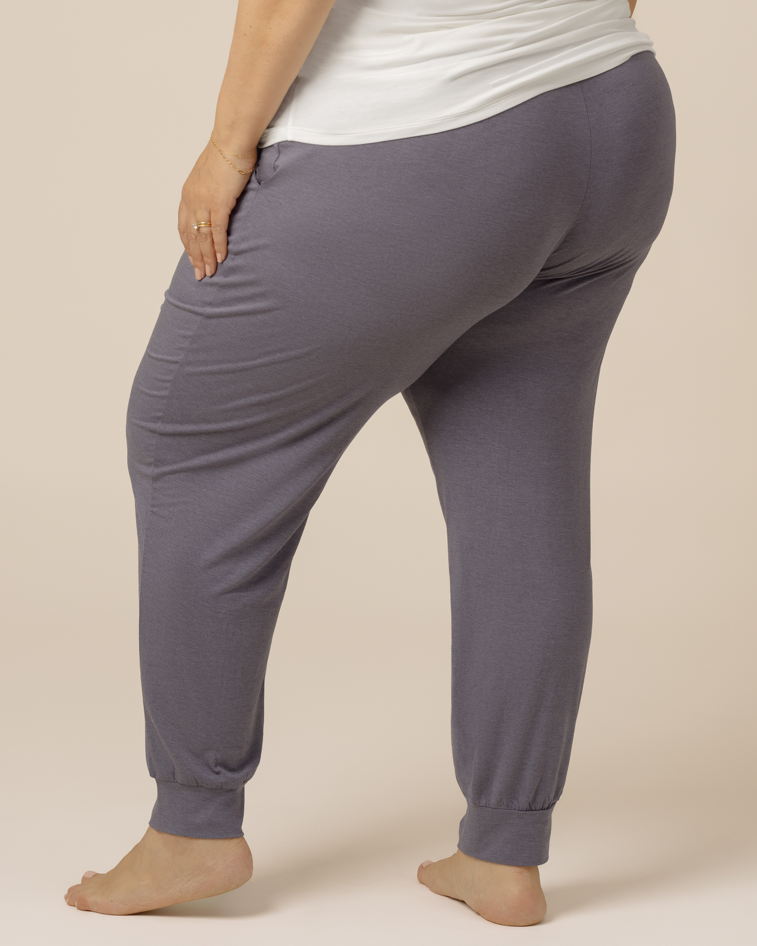 Back view of model wearing the Everyday Lounge Jogger in Heathered Granite